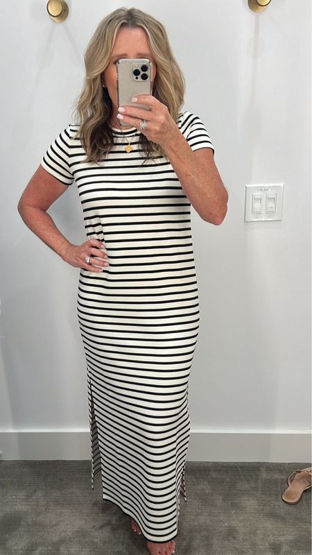 Dress for women over 50, travel outfit for women over 50,  vacation dress for women over 50,  classic black and white striped midi dress. spanx air essentials collection 

#LTKover40 #LTKtravel #LTKSeasonal