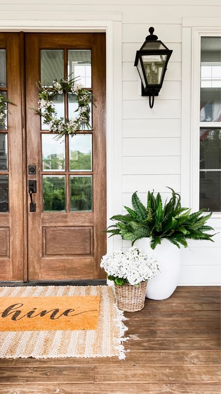 Spring and summer front porch decor large white planters faux ferns layered rug and doormat spring wreaths neutral front door decor nearly natural Amazon Etsy target home accessories outdoor decor artificial silk plants flower shrubs hydrangeas geraniums outdoor lighting lanterns wall sconce light fixtures 

#LTKstyletip #LTKhome #LTKsalealert