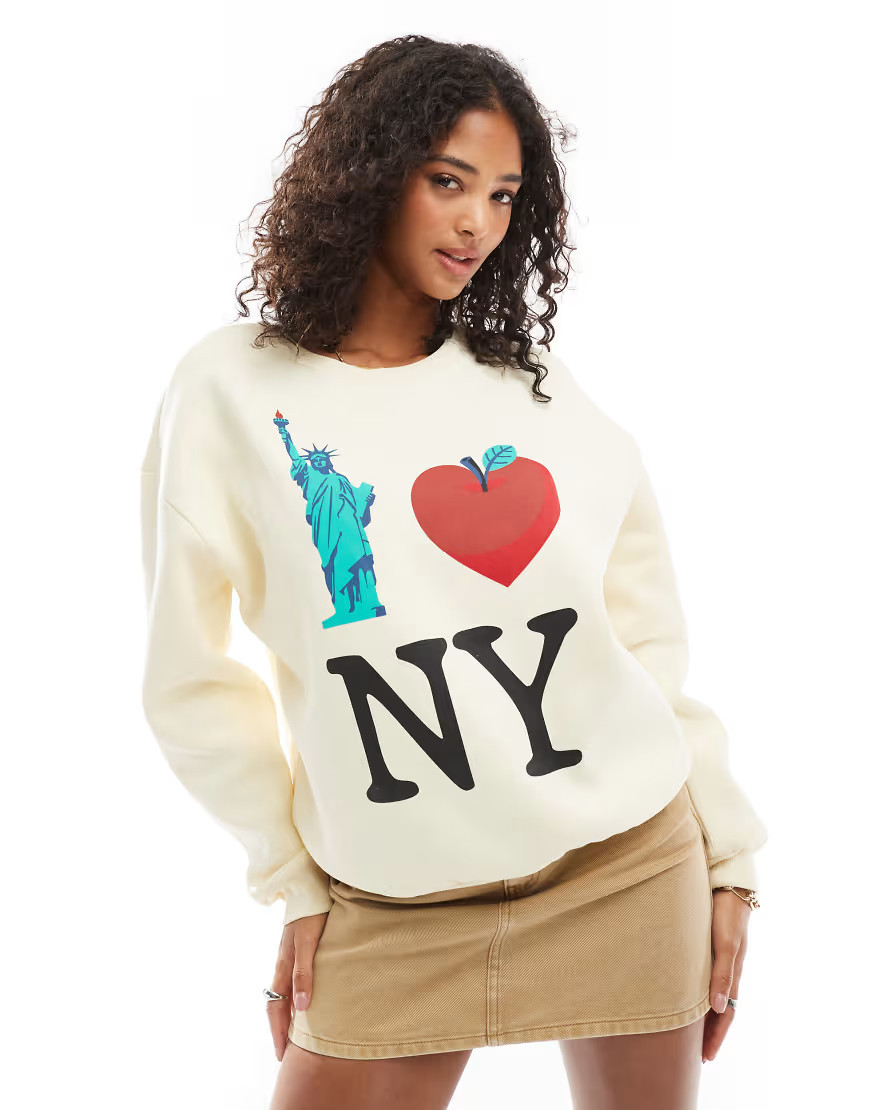ASOS DESIGN brushback sweatshirt with New York Graphic in ecru-White | ASOS (Global)