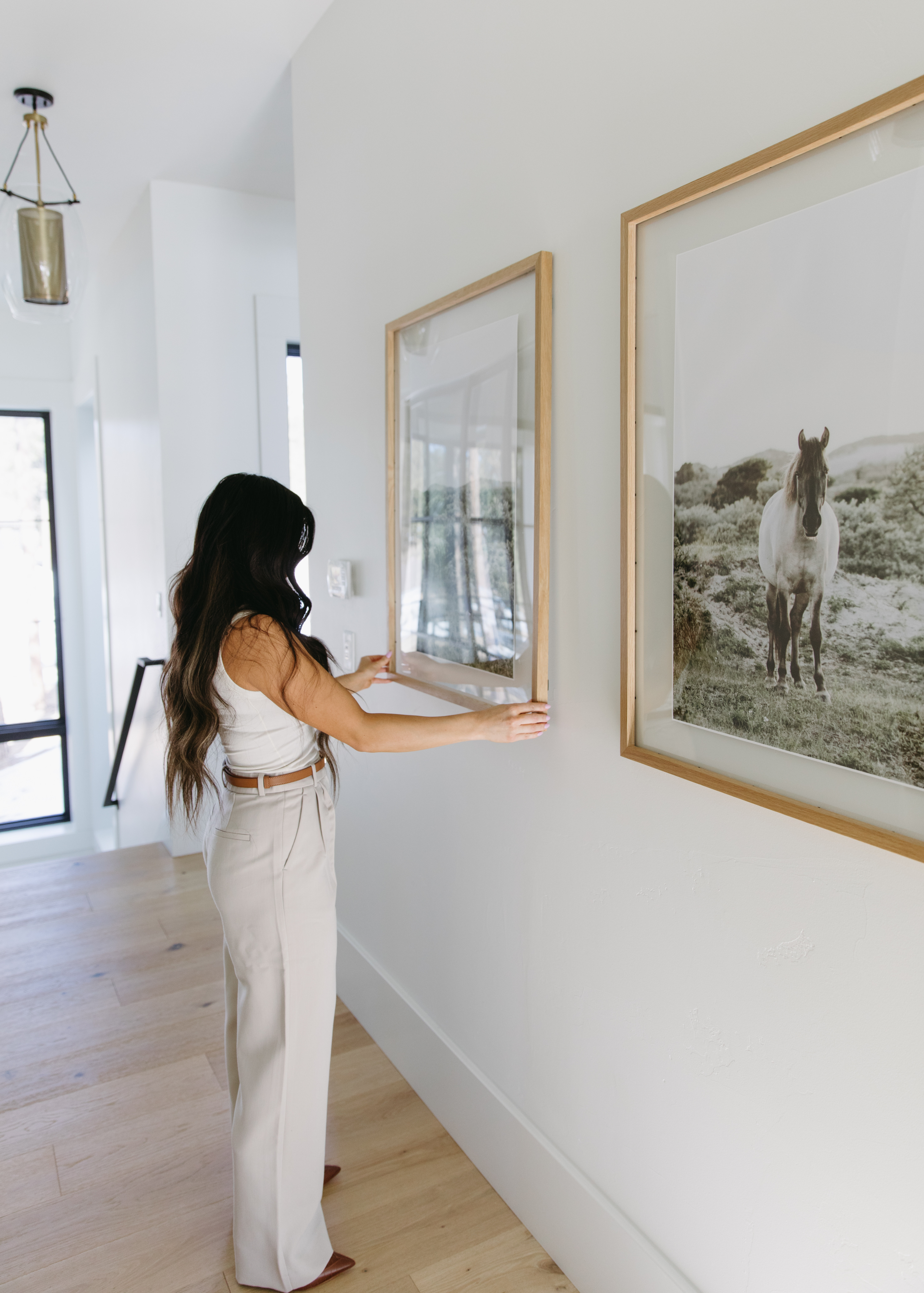 I've been wanting to give this hallway some attention for awhile now and I am so happy with how these prints turned out. These are the natural wood frames in the 29x37.  

 #LTKSeasonal #LTKHome #LTKStyleTip