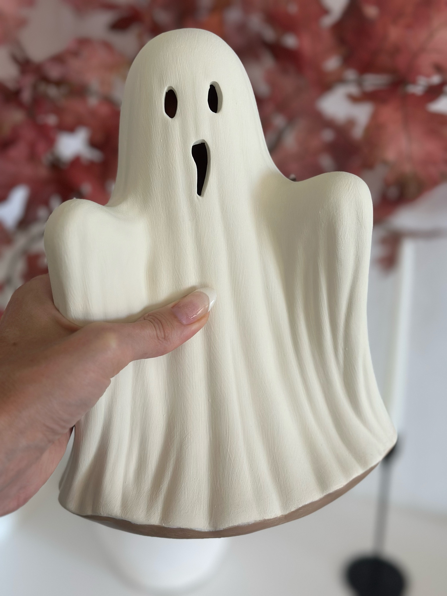 Pottery Barn inspired ghost at 1/3 the price 

I used the terracotta ghost figure from Target & painted the top with Light Ivory and the bottom with Snuggly Teddy Bear acrylic paint 

#LTKSeasonal #LTKHome
