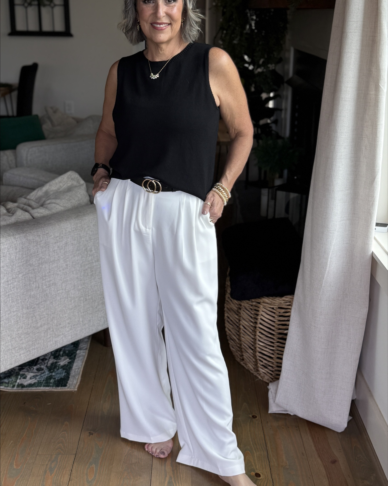 💼 Base Outfit
	•	Black sleeveless sweater (Amazon)
	•	White wide-leg slacks (Amazon)
	•	Black belt with gold buckle

This style story works because it starts with a confident, flattering black-and-white base that allows endless versatility. The sleeveless sweater offers structure and breathability, while the wide-leg white pants provide movement and polish.


#LTKFindsUnder50 #LTKOver40 #LTKStyleTip