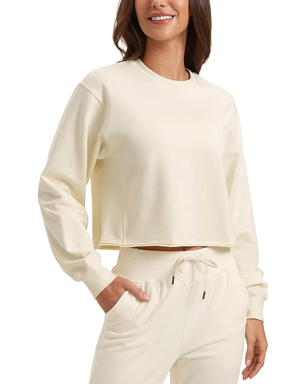 CRZ YOGA Womens Fleece Cropped Sweatshirts Crewneck Long Sleeve Double Raw Hem Workout Casual Pul... | Amazon (US)