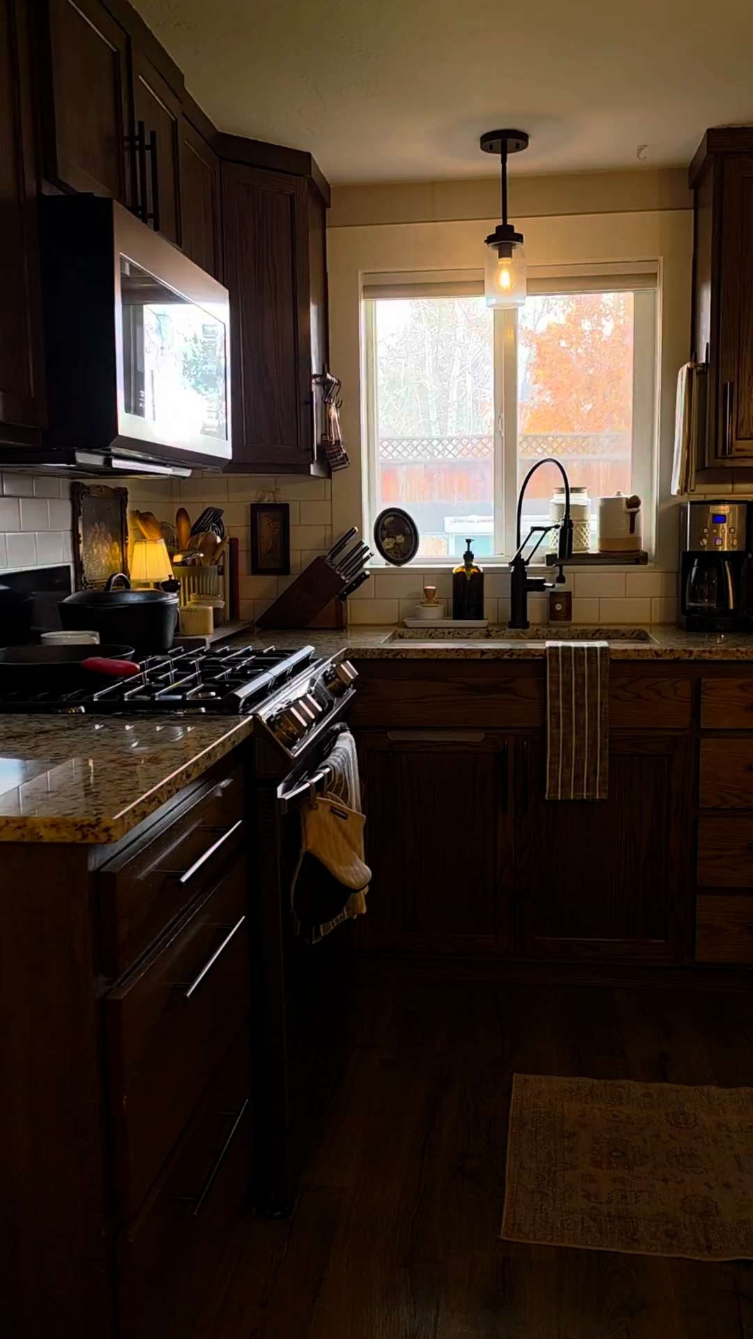 Nobody talks about styling your kitchen counters, but it changes everything. A small lamp, a candle, and copper measuring cups on a tray. Suddenly, your kitchen feels like somewhere you actually want to be. #kitchen 

 #LTKHome