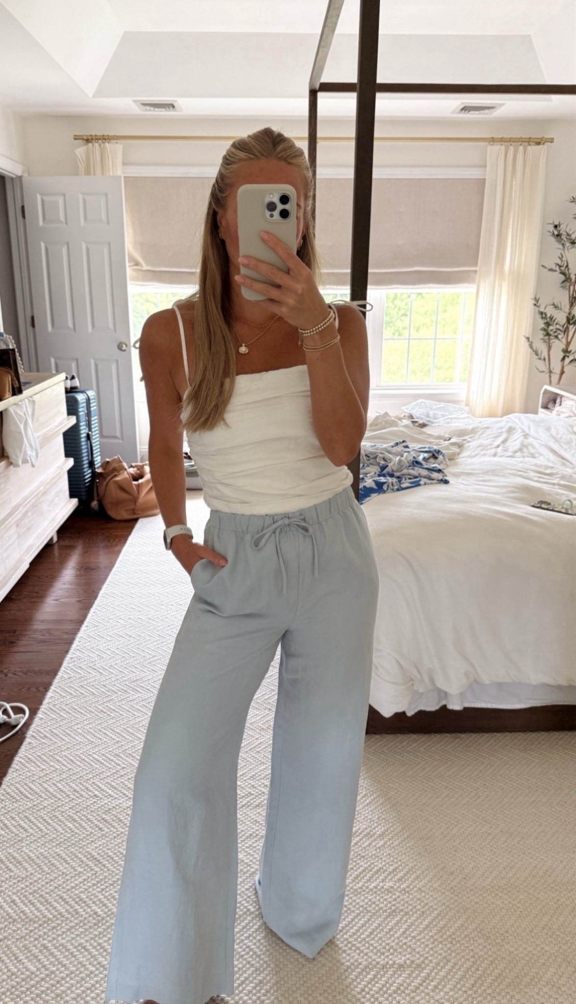Loving this white / baby blue combo 🐚 🌊 my top is on sale for $29! & these Aritzia cruise linen pants DO NOT WRINKLE. These are amazing. The light blue is OOS, but comes in 6 colors perfect for summer & the transition into Fall. I’m wearing size small 

These are the lodge pants, they’re available in different fabrics but neither wrinkle! 

Casual outfit, Florida outfit, vacation fit, summer outfit, weekend fit, Aritzia outfit, white tank, drawstring pant, wide leg pant, brunch date fit, July style, summer style, fall style, fall fit 

#LTKStyleTip