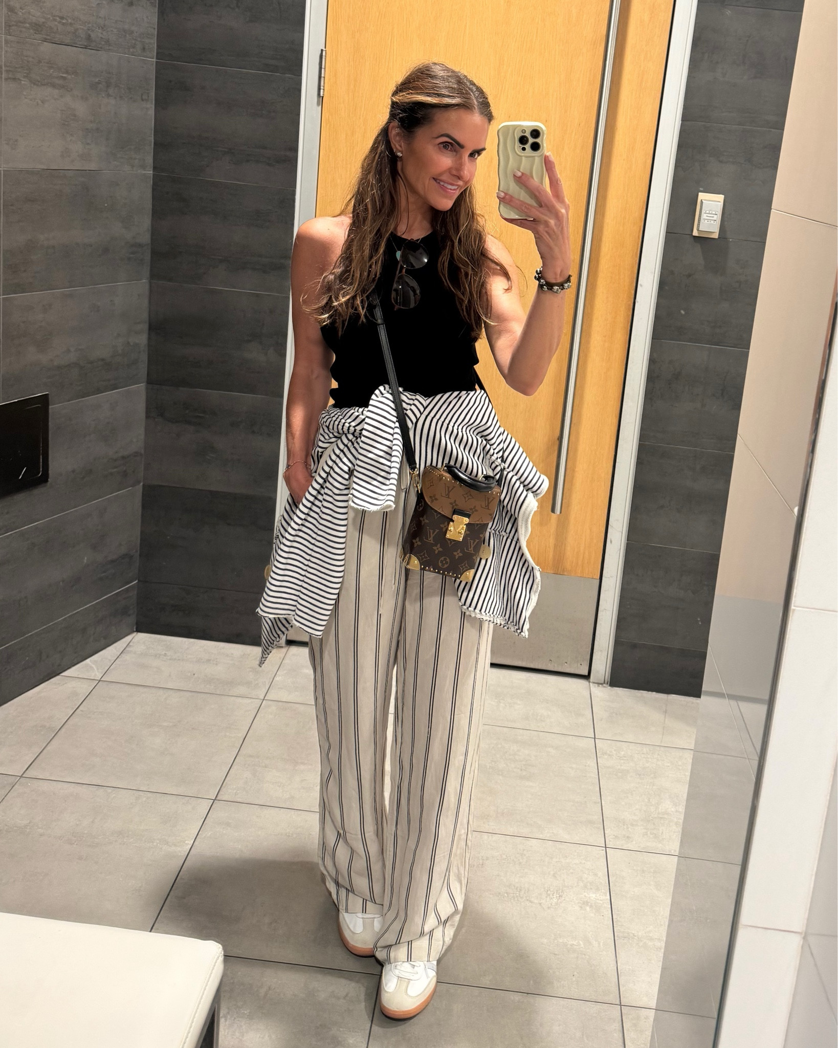 #travellook of the day wearing pants w pockets is a must for me & these linen pants you won’t believe it but are <$30!! 

along w my fav blazer for when i get cold, comfy tank & sneakers too!

#LTKTravel #LTKStyleTip #LTKFindsUnder50