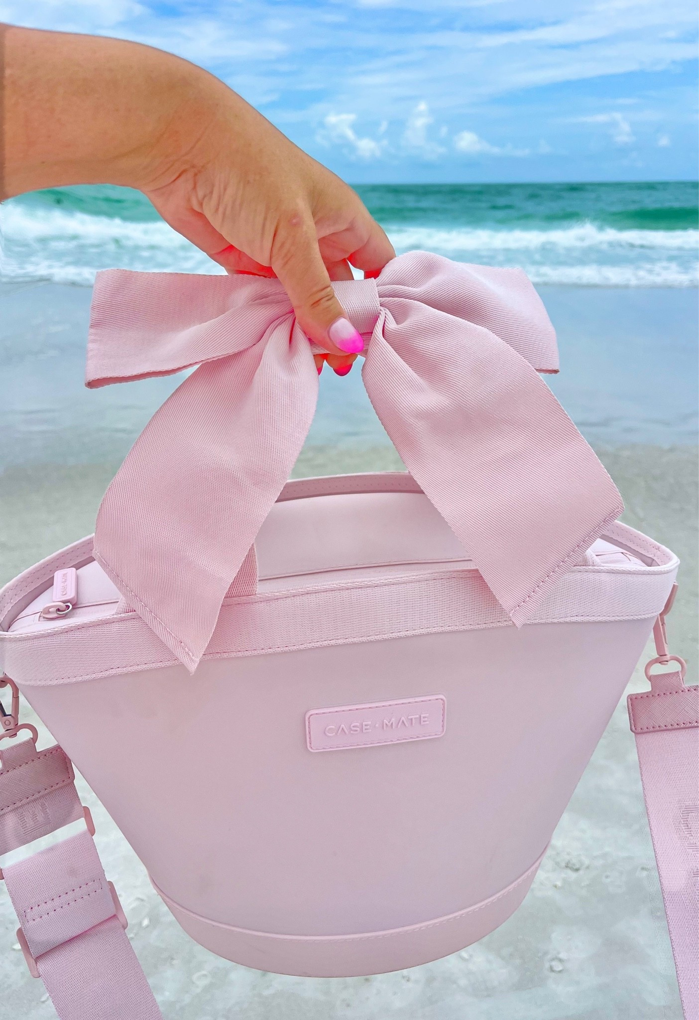 Cutest little bow 🎀 drink cooler ever!!!

#LTKTravel #LTKdayinmylife #LTKActive