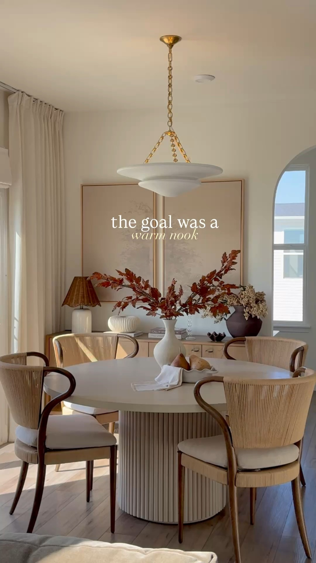 Dining nook corner that lets you unwind and relax☕️✨ it just got ah upgrade with warm wood table and soft flow pendant light〰️

#LTKmorningroutine #LTKHome #LTKSeasonal