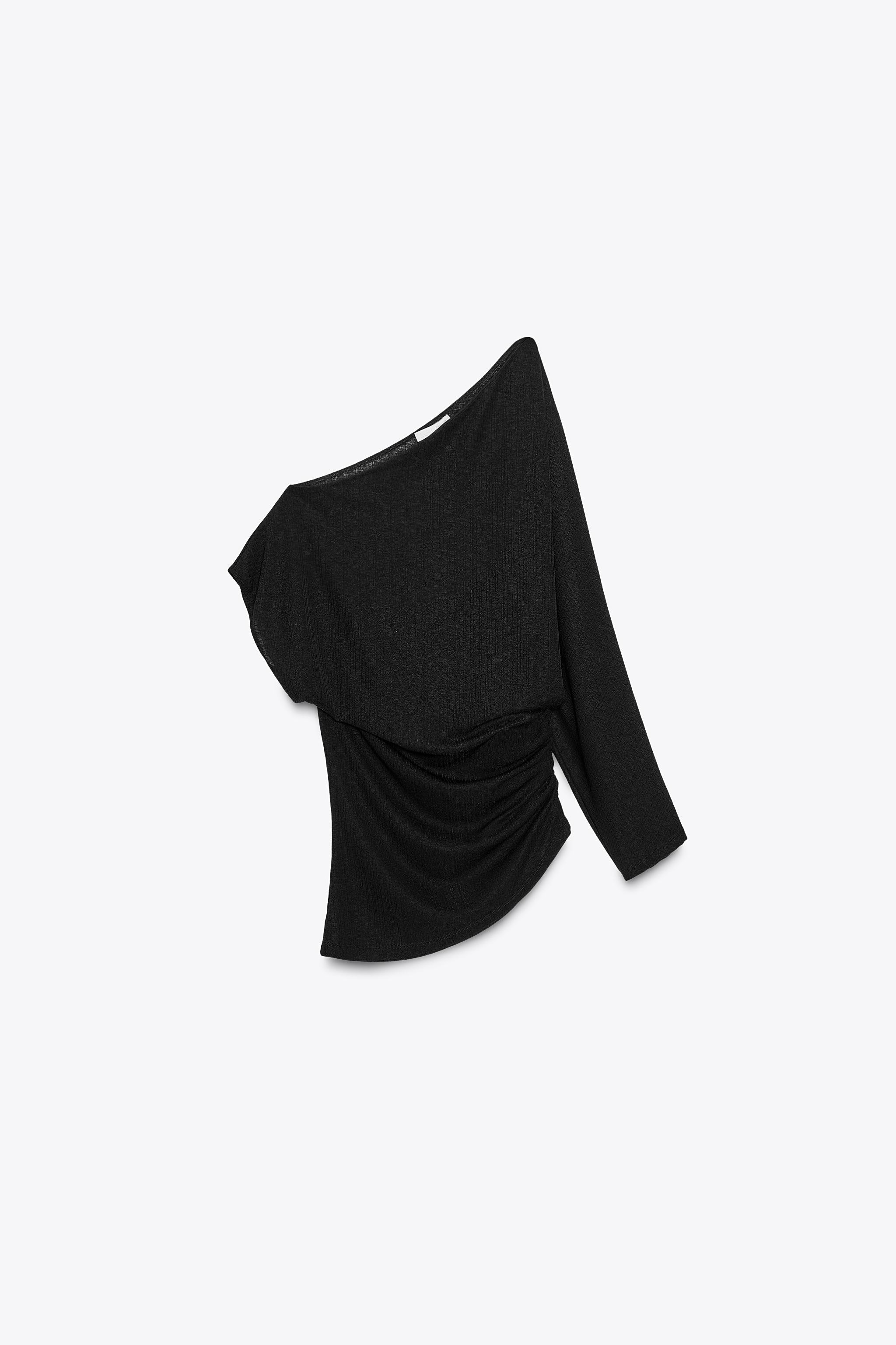 FLOWY ASYMMETRIC TOP$ 35.90Black | 3644/808/800Add to cartAddAsymmetric neck top with one short s... | Zara US