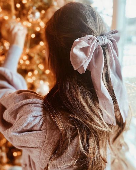 Tying it with a bow! 🎀
 
One of my favorite parts of holiday styling is all the pretty hair accessories💖

I love this bow so much - I have it in four colors! It is a barrette, and has the most beautiful pop of shine to it!✨

#LTKHoliday #LTKparties #LTKSeasonal