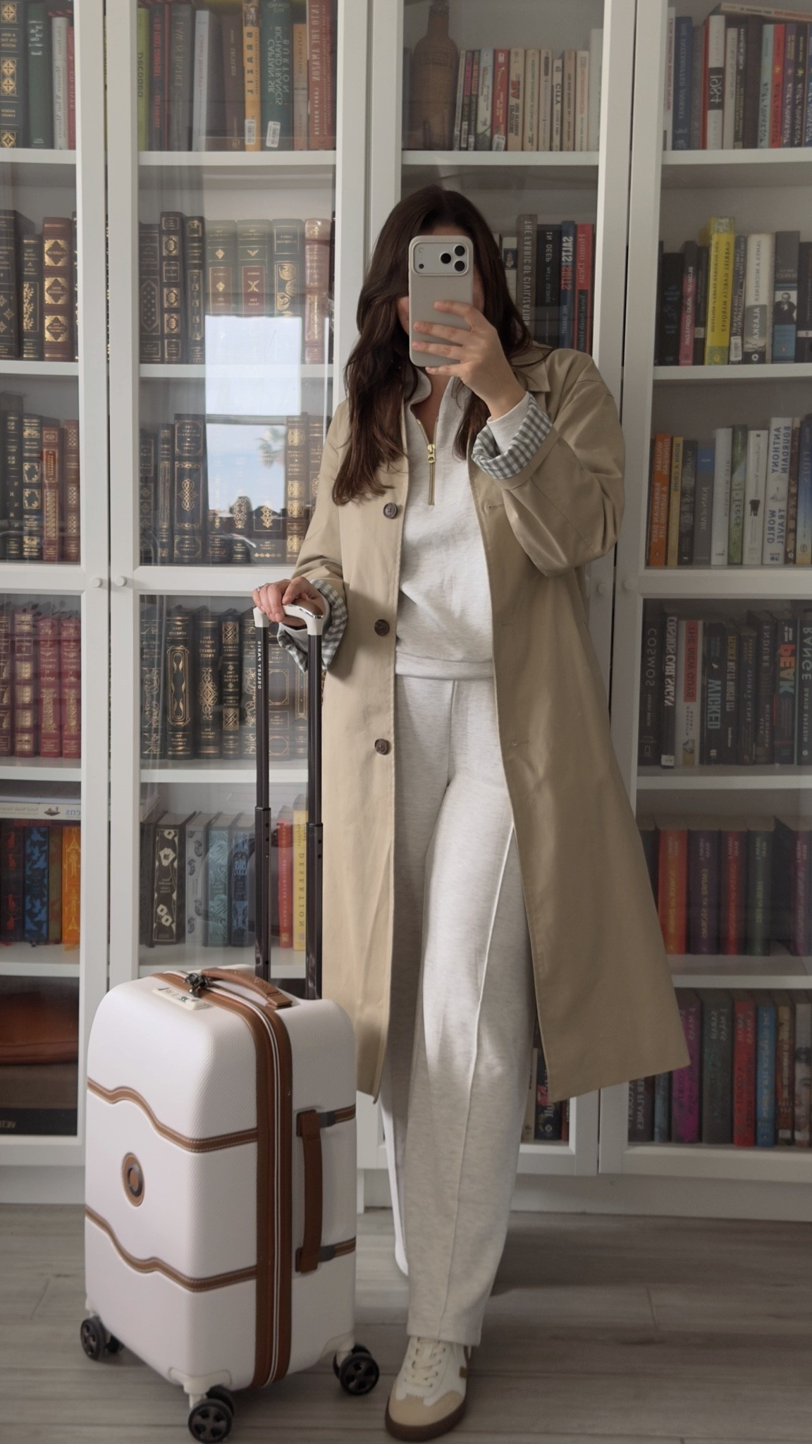 Look du Jour ✈️

Never been more comfortably chic for a travel day! Loving this @Varley set 🤍

Outfit details:
Set: Varley, wearing size M in both pieces 
Trench: Target, currently sold out! I linked alternatives 
Carry-on: French luggage company, Delsey Paris 
Shoes: Veja 

With Amour, M.
