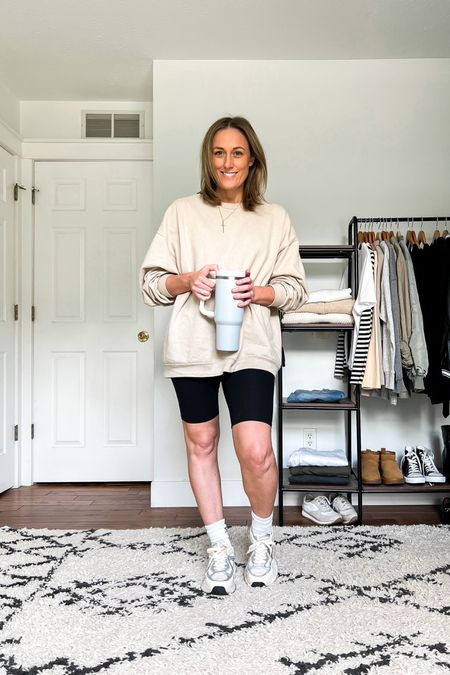 Summer outfit idea. Casual outfit idea. Oversized sweatshirt. Crewneck sweatshirt. Bike shorts. Crew socks. Sneakers.

Sizing
Sweatshirt is an XXL.
Bike shorts and sneakers are older, but I linked similar options.

#LTKunder100 #LTKunder50 #LTKstyletip