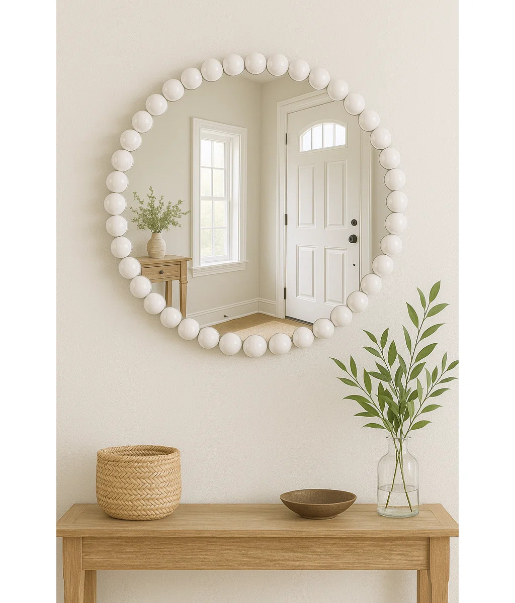 Enhance your home décor with this 36" round wall mirror featuring a white beaded iron frame. The... | Wayfair North America