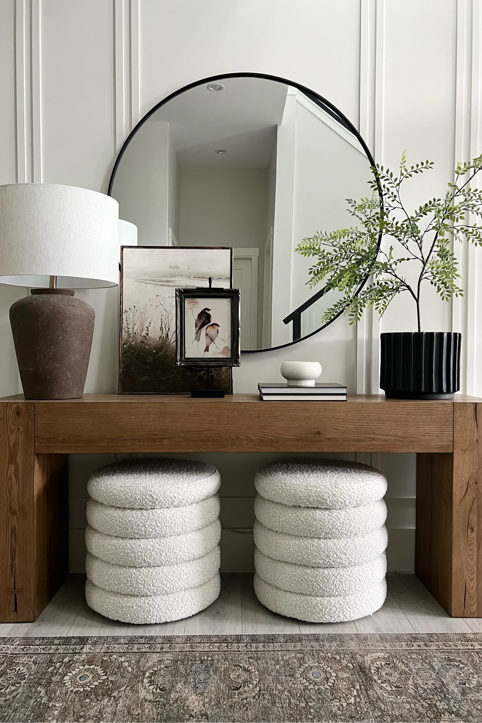 Entry console: Summer edition ✨
A lighter look with a light and airy fern, white stoneware candle, and a charming bird print! 
The fern is just one single stem! I have it in floral foam inside the planter…moss on top. 
Modern organic home decor

#LTKFamily #LTKHome