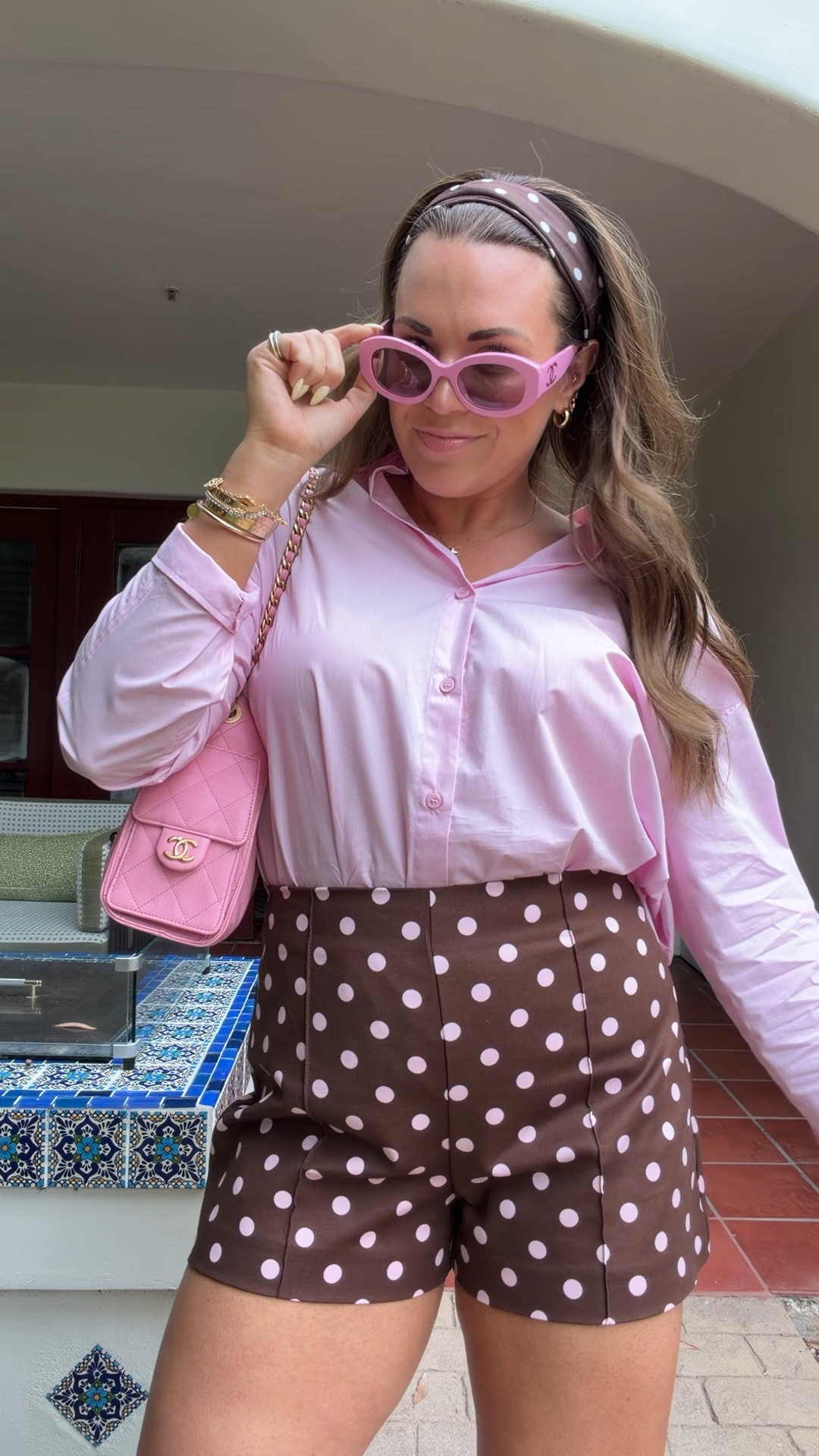 curvy midsize pink and brown polka dot outfit for spring! in the size medium in pink button down (runs big!) and size large in brown polka dot shorts 🩷🤎 wore this outfit to brunch on vacation!

#LTKTravel #LTKMidsize #LTKSeasonal