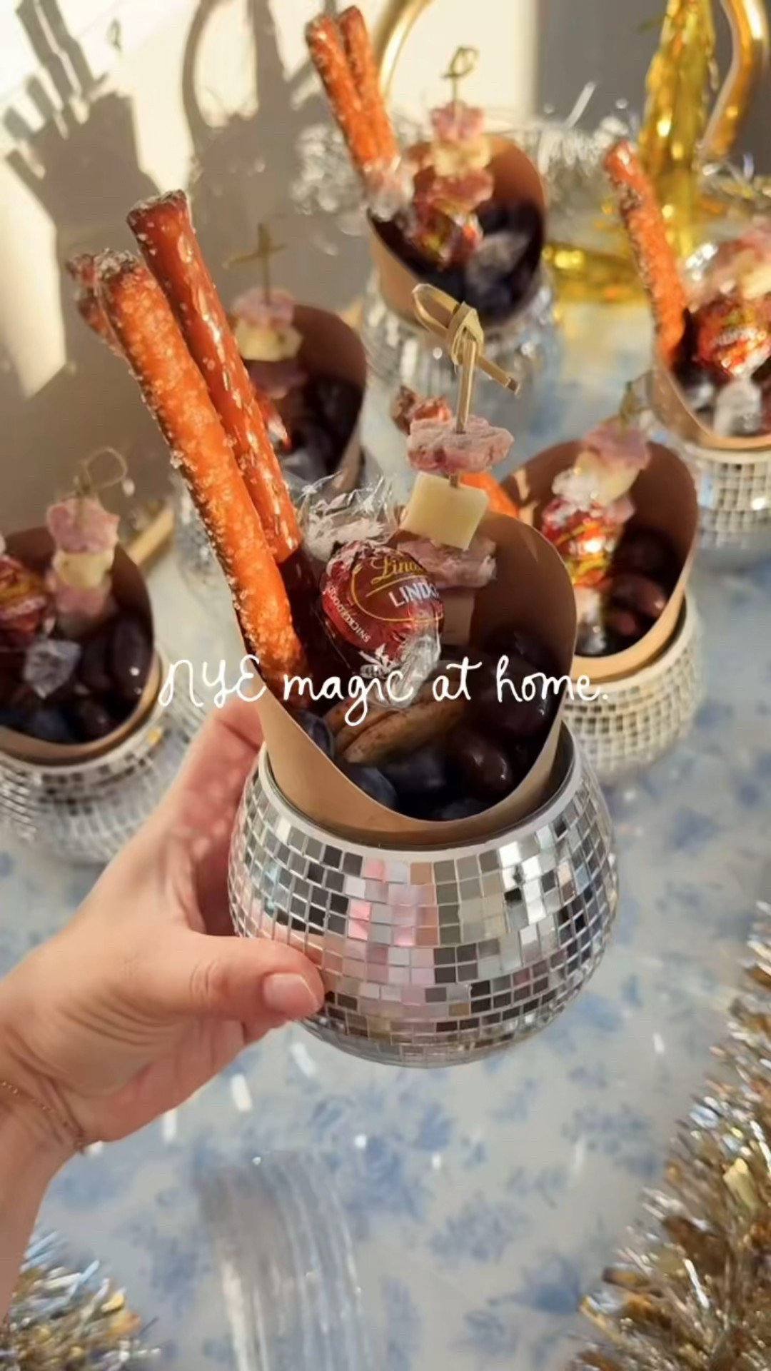 Little NYE Magic over here! ✨ Disco ball charcuterie cups on our cart to make the night feel extra special… easy, festive, and so fun for celebrating together at home. It’s the small details that make the memories 🪩☁️  SHOP : https://amzn.markable.ai/GIuq1sht  #nyeathome  #festivehosting  #littlemoments 

#LTKHoliday #LTKSeasonal #LTKselfcare