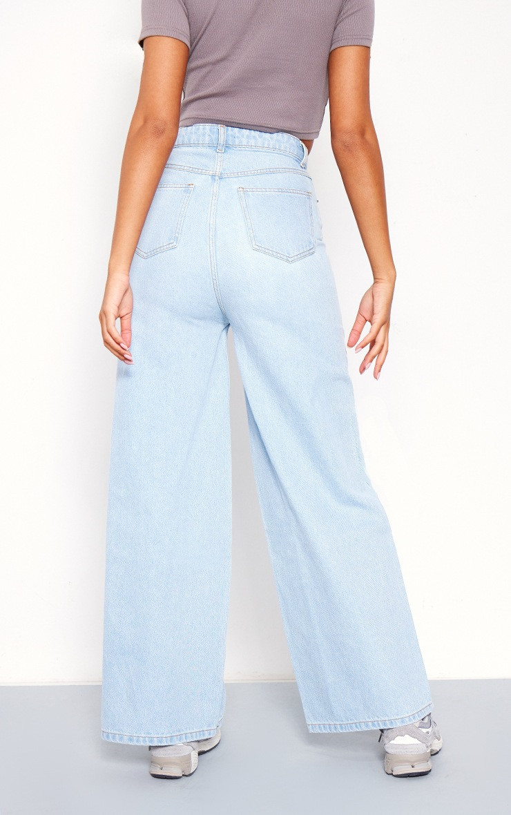 Tall Bleach Wash Low Waist Extreme Wide Leg Jeans | PrettyLittleThing US