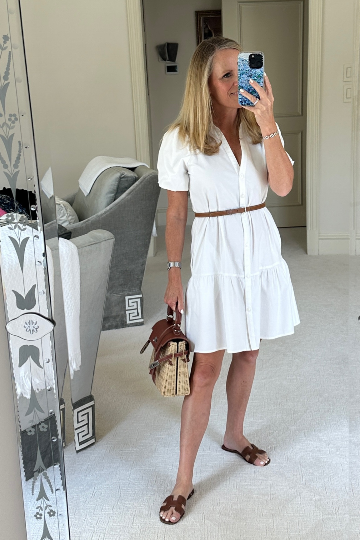 Love this perfect white mini dress!! 
Make it work for Fall Transition with brown leather accessories! 
I wear white as long as it’s hot!! Don’t worry about the old rule of “No white after Labor Day!” 
It fit true to size. I am 5’2” tall and wearing XS for size reference
It also comes in multiple colors! And perfect for game day! 