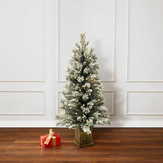 LuxenHome 4FT Potted Flocked Christmas Tree, Battery Operated Small Christmas Tree Prelit with 70... | Amazon (US)