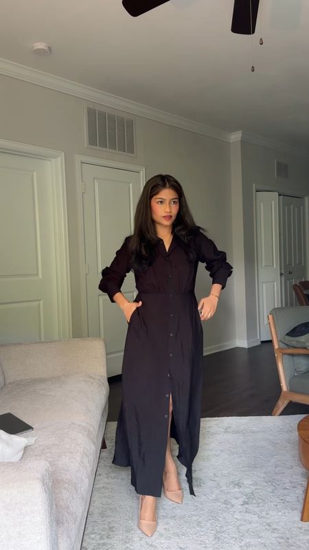 Black flowy and lightweight Long Sleeve Collared Midi Crepe Shirtdress—not long on petites (I’m 4’11” and can wear without heels). Front buttons/unbuttons all the way and there’s cinching around waist. The sleeves also have buttons to keep the wrist area fitter but can also be rolled up like a shirt if needed. 
Wearing small. From Target and under $50 

#target #mididress 

#LTKfindsunder50 #LTKVideo #LTKSeasonal