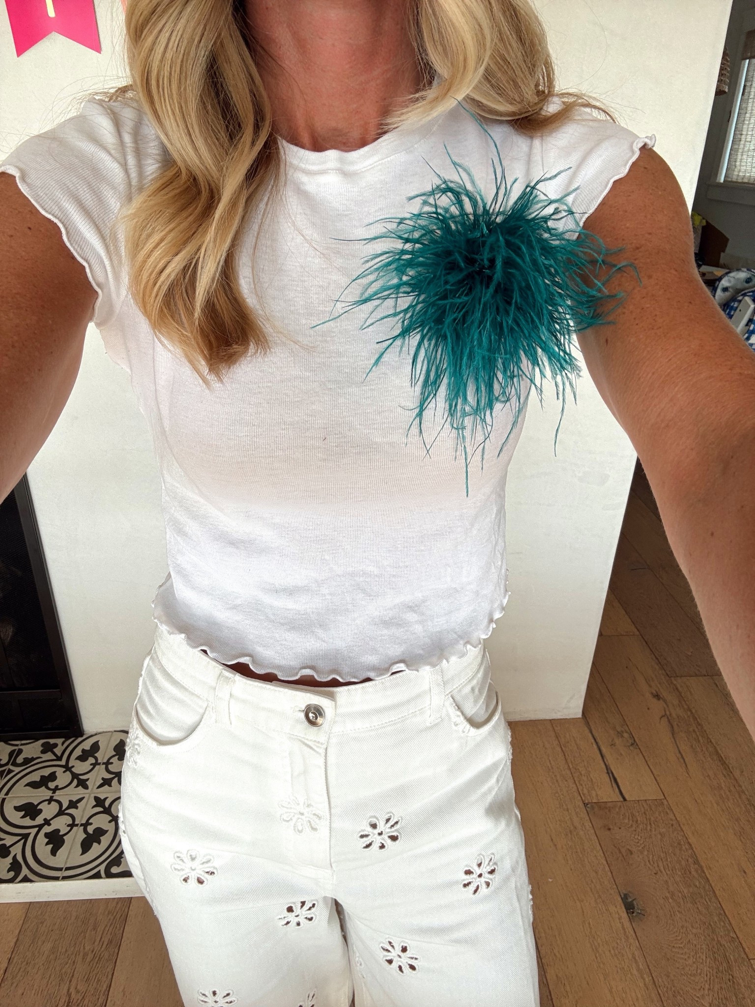 White on white with a pop. Feather brooch and eyelet jeans  

#LTKdayinmylife #LTKSeasonal