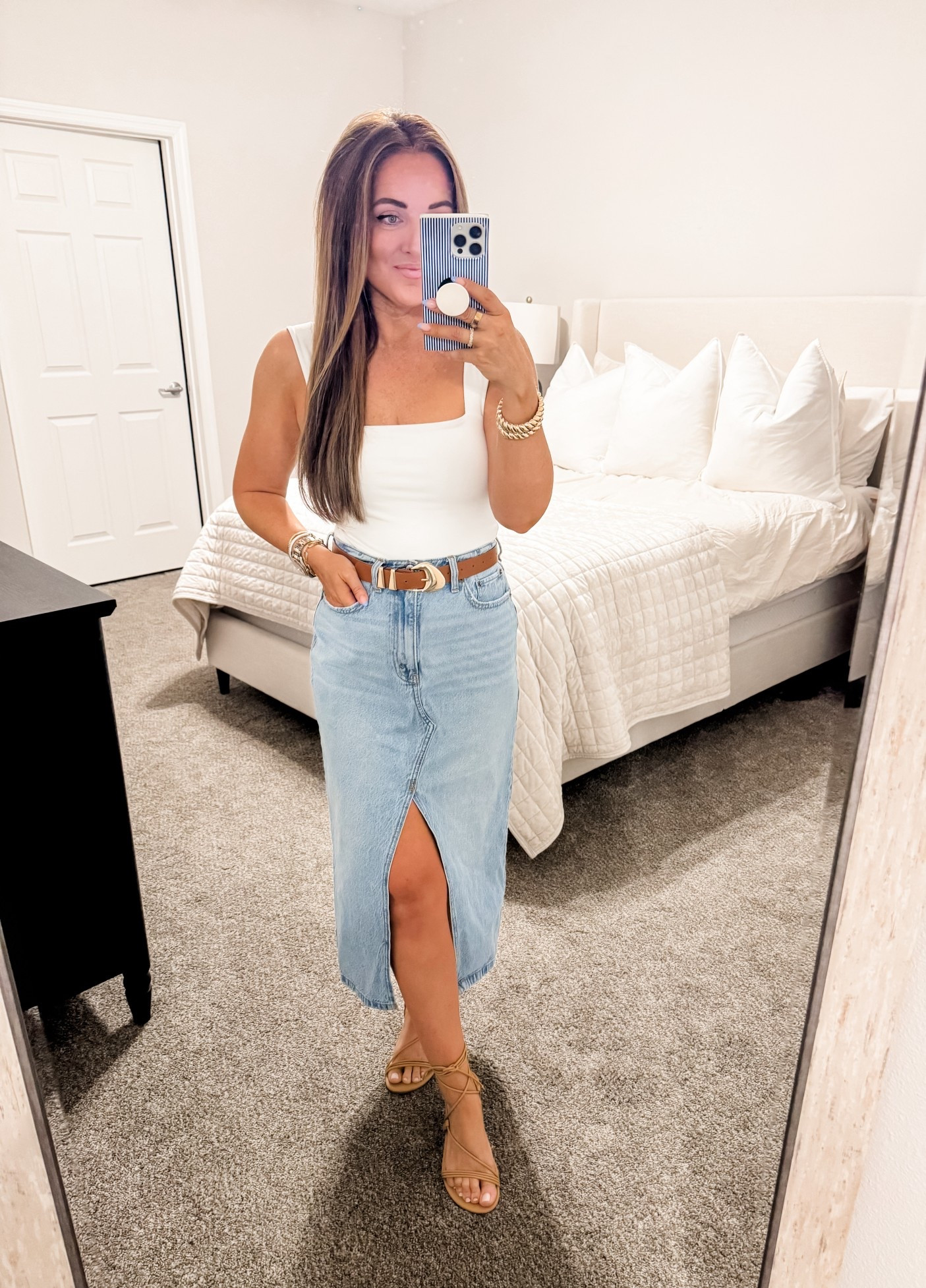 Tank - M, skirt - 28 (tts) 
5’2” 140 lbs 
—
Abercrombie skirt | Denim midi skirt | Denim skirt | White tank top | Abercrombie body suit | Tie sandals | Amazon sandals 

#LTKFestival #LTKWorkwear #LTKmomlife