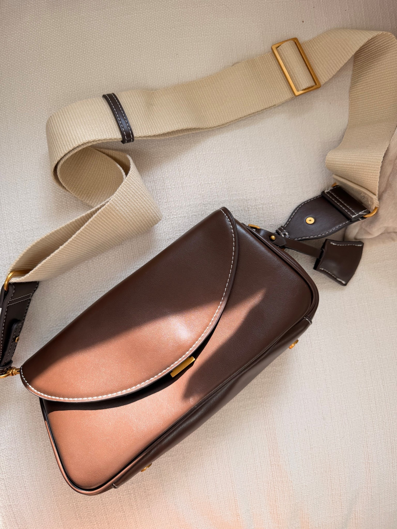 Long, structured, and so chic 🤎 this Zara bag instantly elevates any outfit. The contrast stitching + mixed straps make it feel designer without the price tag ✨
Adjustable crossbody (love the fabric strap option 🙌), magnetic pocket for easy grab, and a secure flap closure = practical and cute.
Perfect everyday bag that goes with literally everything 🤎 #LTKStyle #LTKItBag


#LTKgrwm #LTKootd #LTKFestival