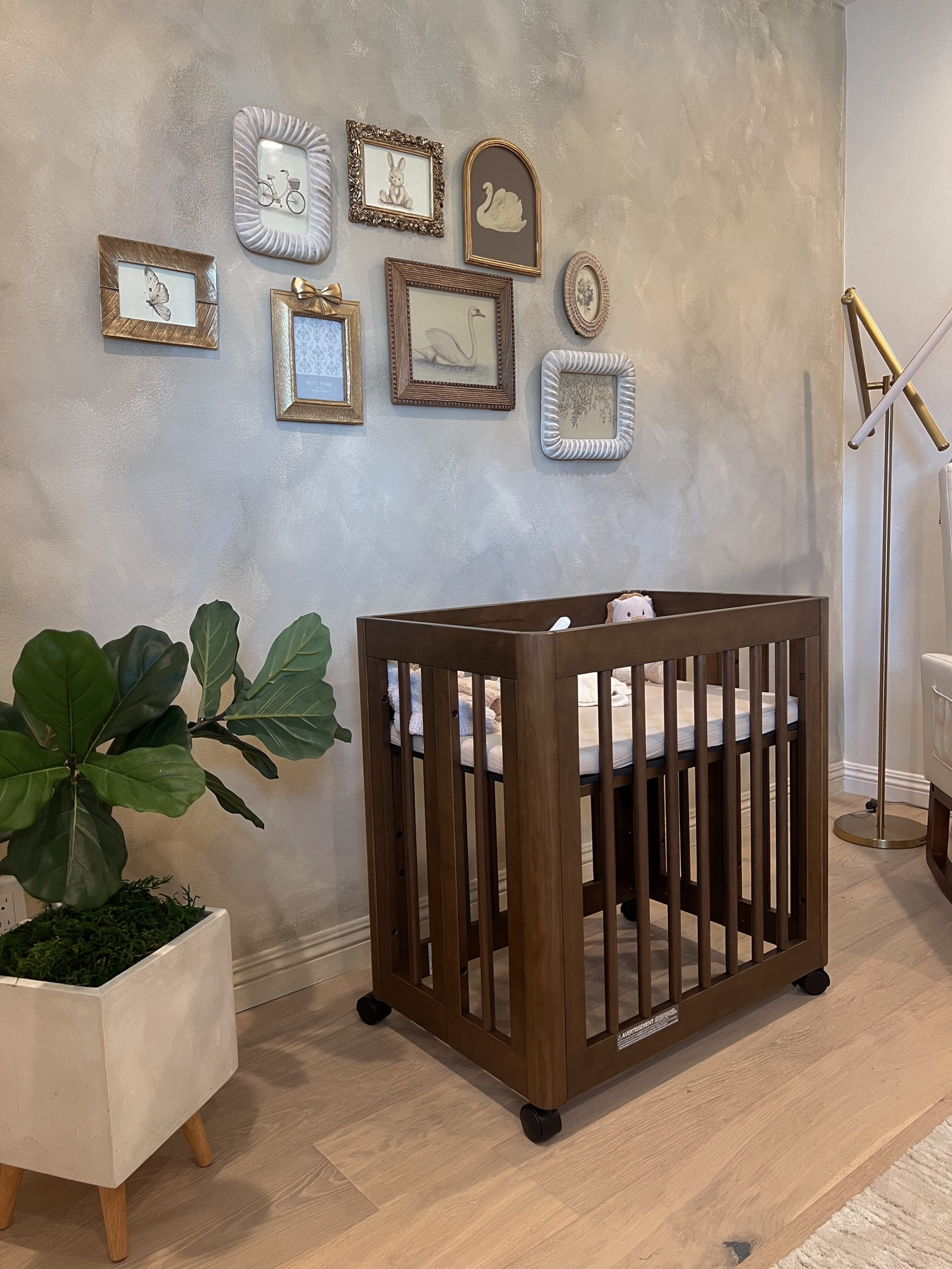 Girly Vintage Inspired Neutral Nursery 

Babyletto crib - bassinet mode (current pictures) converts into a larger crib and bed until the age of 5, natural walnut 
Baby Bassinet Muslin Sheets (color fog), switch to CRIB sheet once crib is larger size
Vintage photo frames 
Vintage nursery photo prints 
Faux plant 
Faux moss 
Planter 
Gold floor lamp 
Washable rug 

Maternity 
Bump 
Nesting 
Newborn 


 

#LTKBump #LTKHome #LTKBaby