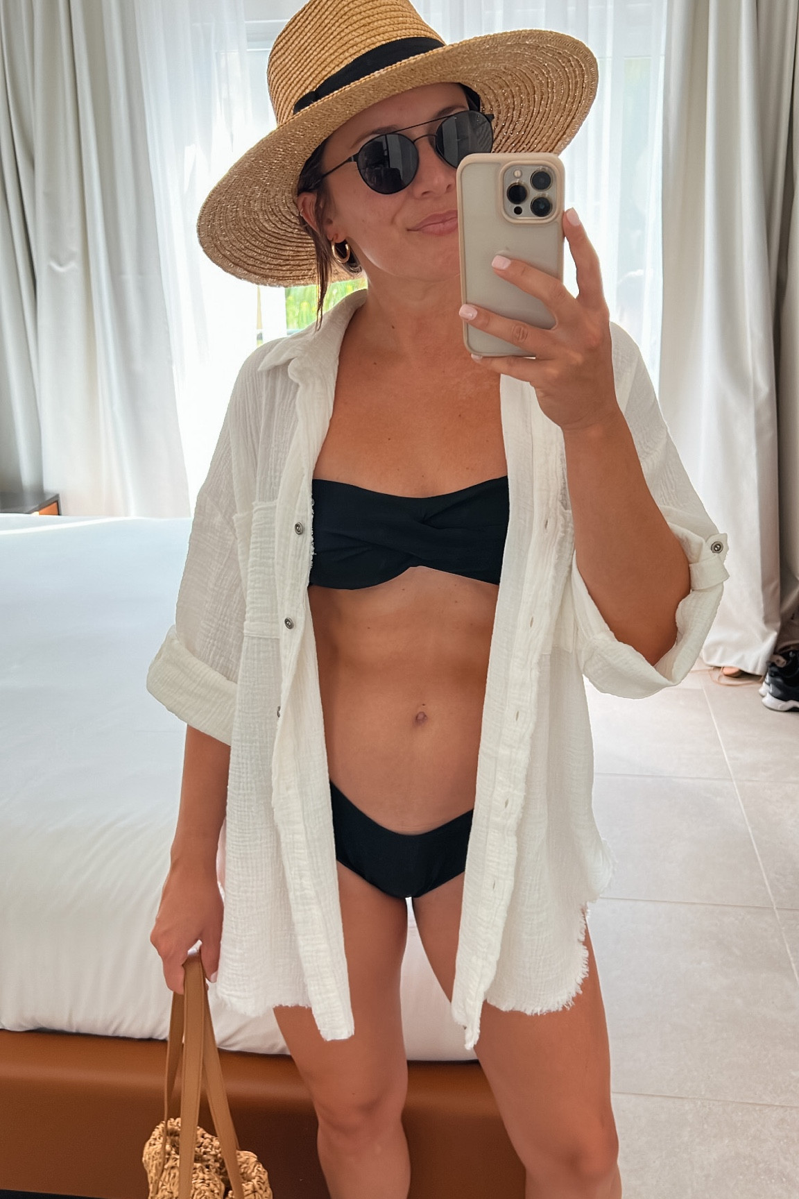 black bandeau cheeky high rise bikini + fringe button up for a Ibiza beach day

#LTKtravel #LTKswim #LTKunder50