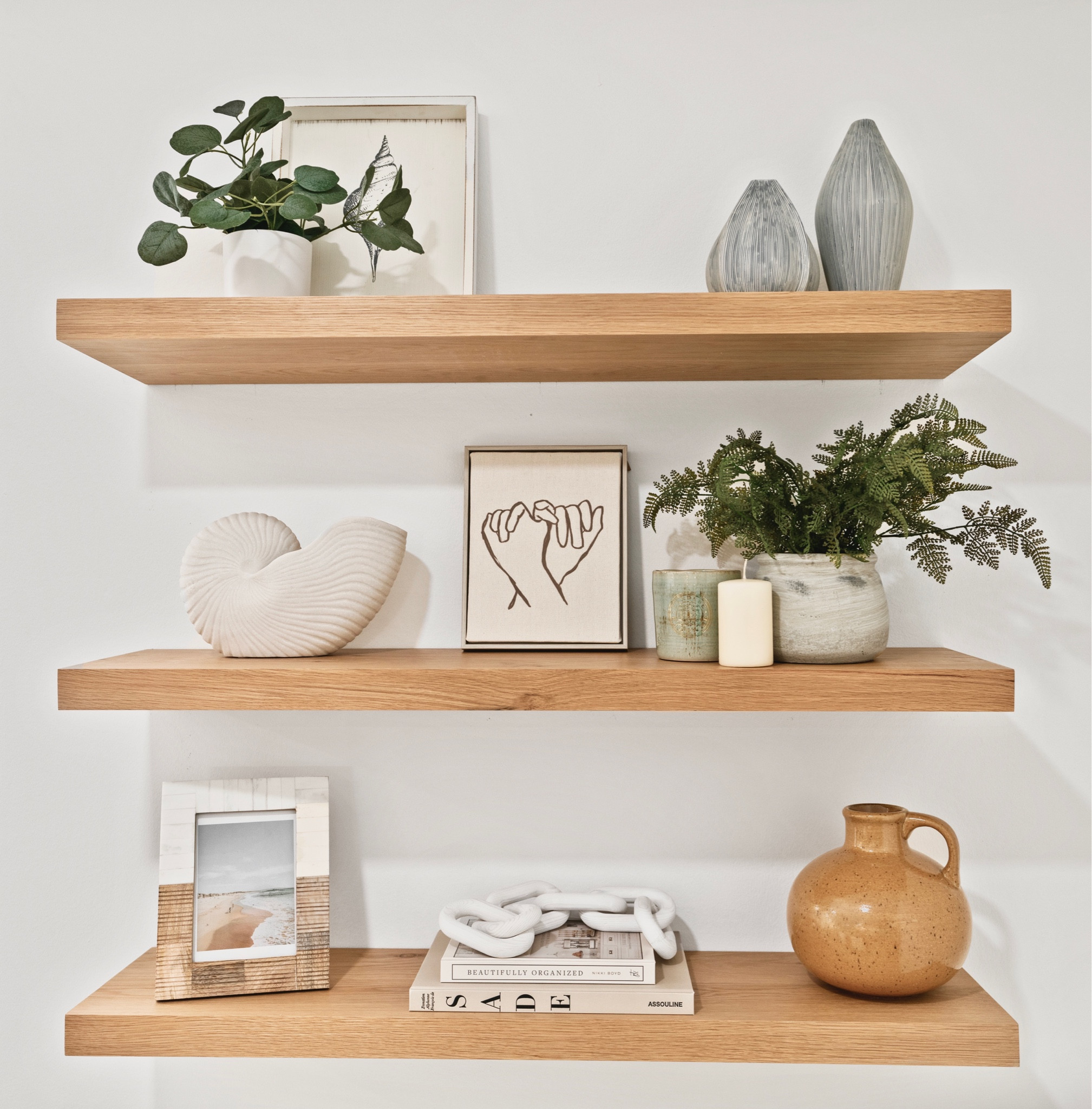 How to style your shelves. Shelf decor ideas, earthy calm style. Frames, faux plants, home decor.

#LTKFind #LTKhome #LTKunder100