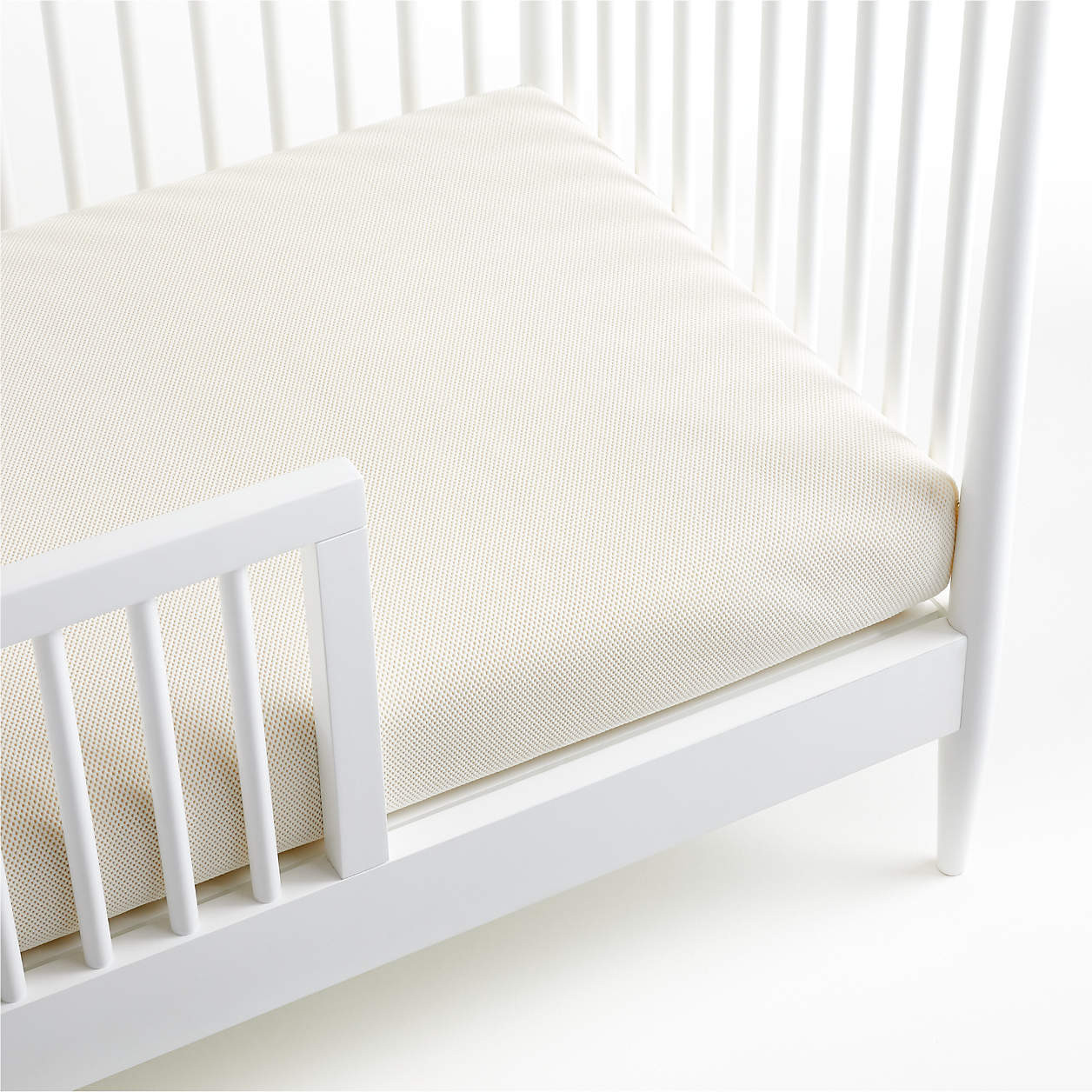Naturepedic Organic Cotton Breathable 2-Stage Crib Firm Mattress with Waterproof Breathable Pad +... | Crate & Barrel