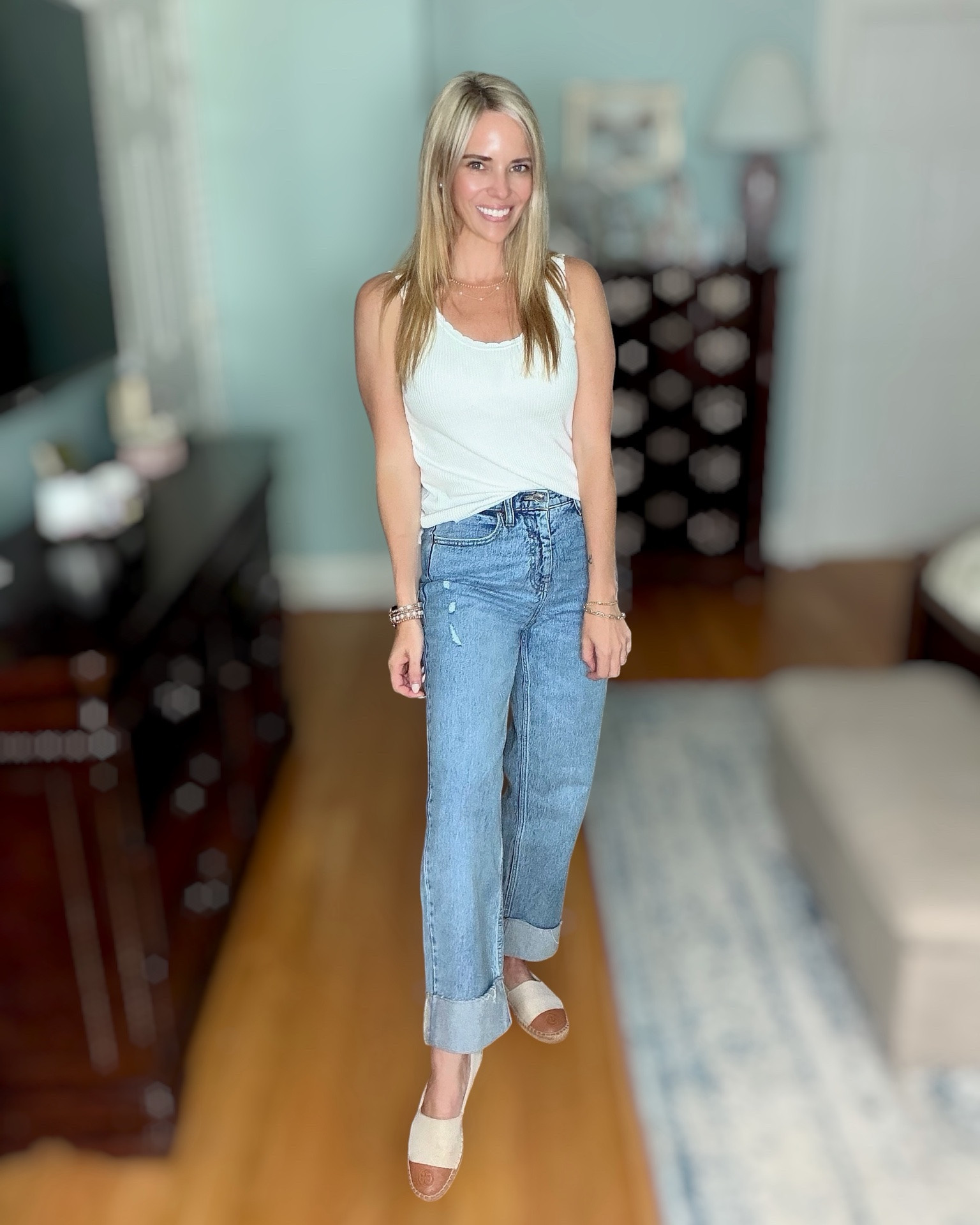 🤍Everyday Elevated Basics

A great pair of jeans and a classic white tank will never go out of style! 🤍 These cuffed Free Assembly jeans are such a flattering fit, and I paired them with a feminine ruffle-trim tank, timeless espadrilles, and simple gold accessories for an effortlessly polished everyday look. ✨

I’m also linking my favorite layered necklaces, bracelet stack, pearl studs, aviator sunglasses, and similar watch accessories to complete the outfit. These are the kind of versatile pieces you’ll reach for again and again! ☀️👖

Whether you’re headed to lunch, running errands, or meeting friends for coffee, this casual chic outfit is comfortable, easy to wear, and looks put together with minimal effort.

Classic wardrobe staples, casual chic outfit, white tank outfit, cuffed jeans, Free Assembly jeans, Walmart fashion, affordable style, everyday basics, neutral outfit, gold jewelry, layered necklaces, espadrilles, women’s summer style, transitional outfit, timeless fashion, effortless everyday look.

#LTKOver40 #LTKPetite #LTKootd