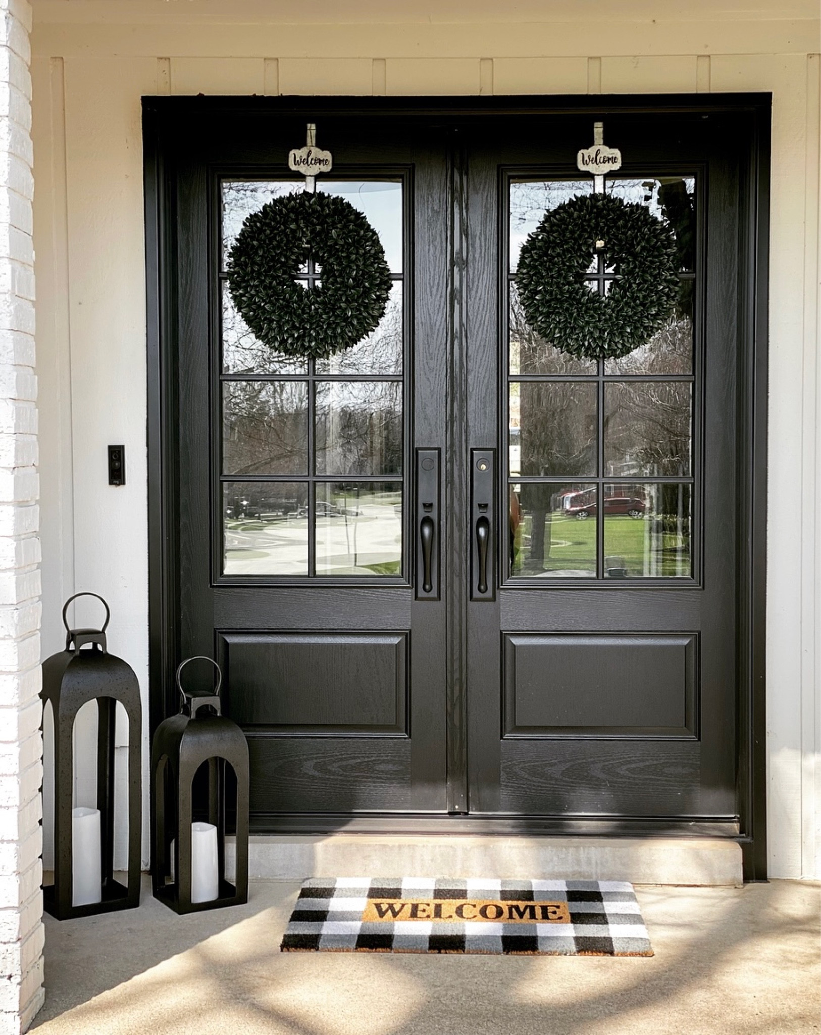 Front Porch Decor. Target lanterns, Kirklands rug, Amazon wreaths (linked similar)

#outdoordecor #home #porch #targethome #targetfinds 

#LTKunder100 #LTKhome #LTKunder50