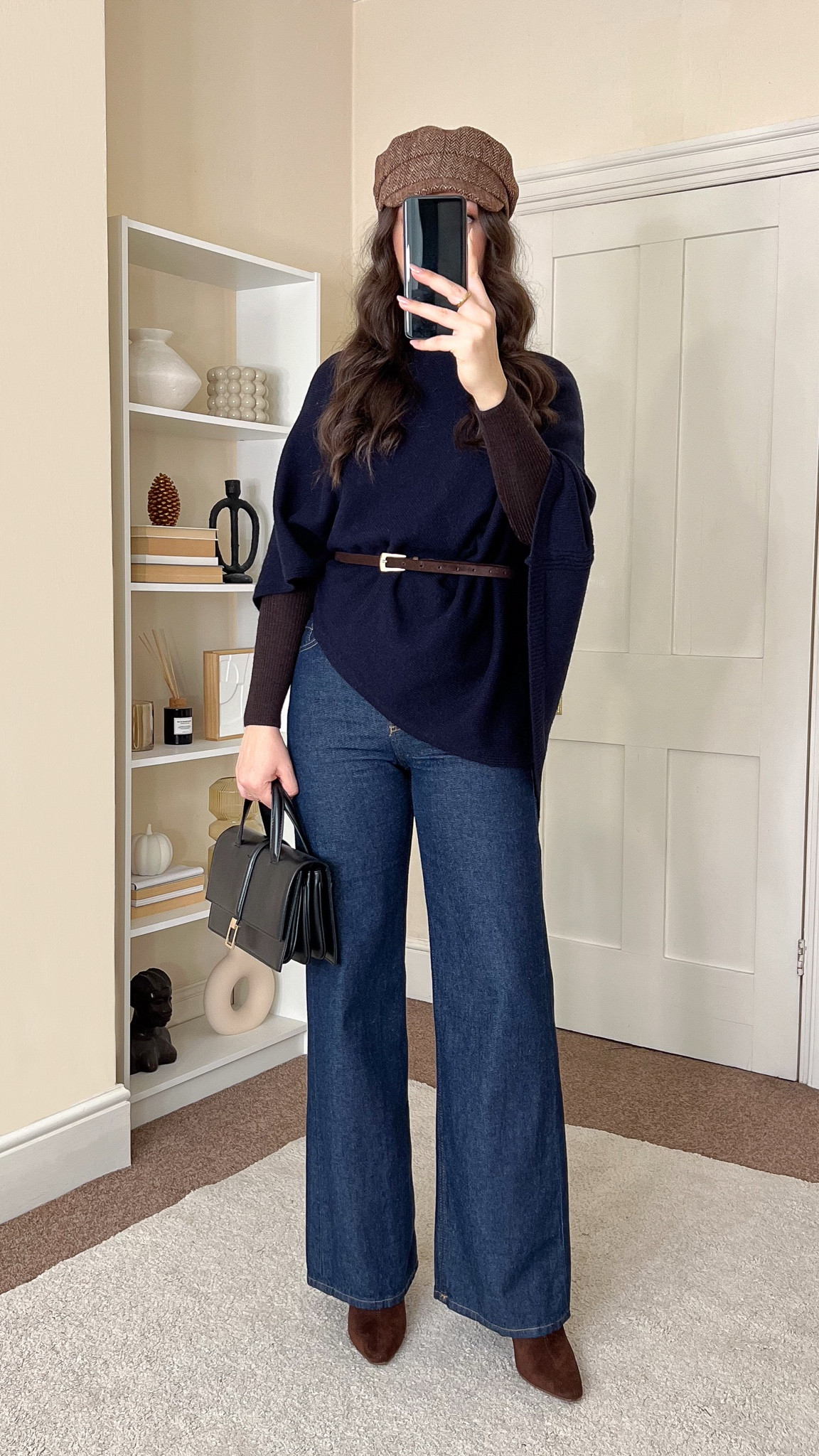 Chic early winter outfit. Roll neck is Uniqlo size S. Cap is John Lewis. Jeans are H&M, size UK8. Boots are River Island. Bah is Zara, old.

#LTKstyletip #LTKwinter #LTKCyberWeek