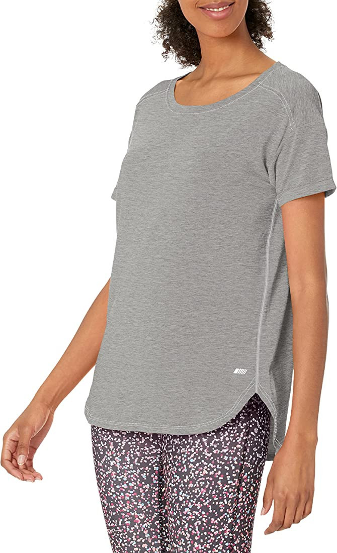 Amazon Essentials Women's Studio Relaxed-Fit Lightweight Crewneck T-Shirt (Available in Plus Size... | Amazon (US)