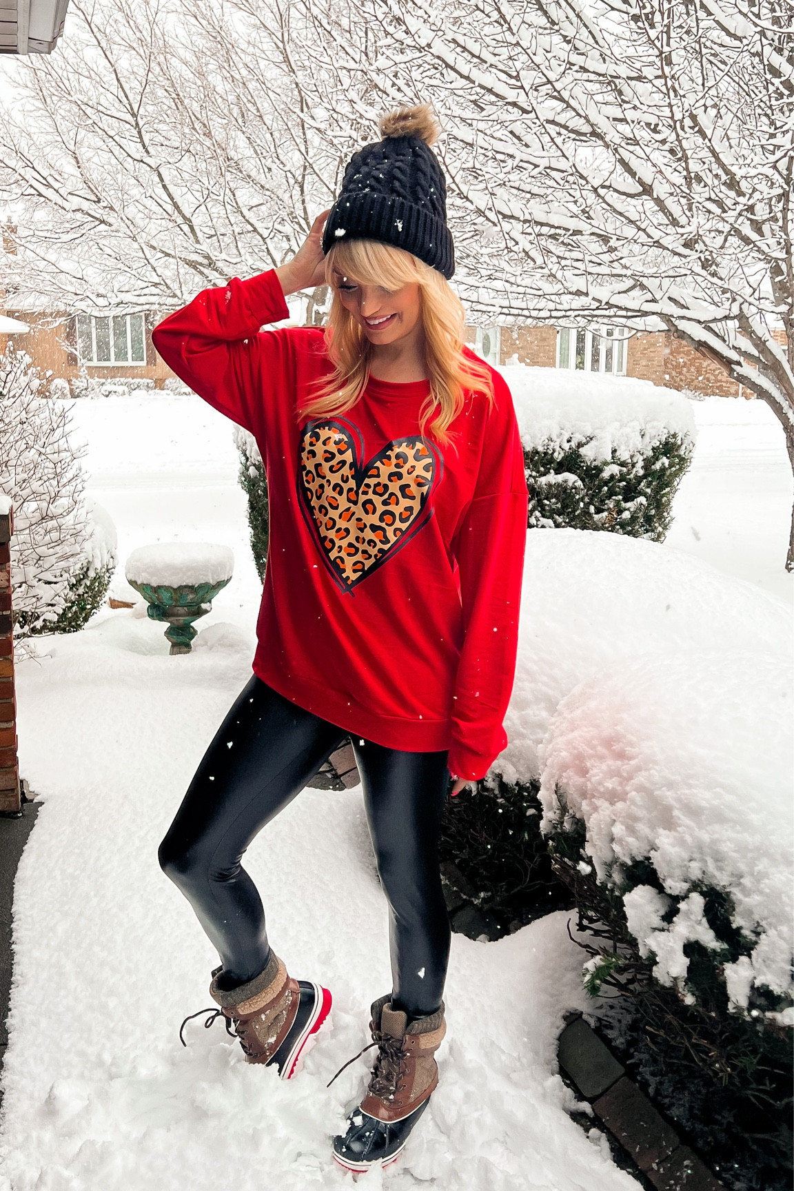 Valentine’s Day heart sweatshirt and I sized up to a large for an oversized fit - patent faux leather leggings - fur Pom beanie - winter boots - Valentines Day Fashion - Valentine’s Day outfit - casual look - Amazon fashion - winter fashion - winter outfit - Amazon finds - Amazon favorites 

#LTKshoecrush #LTKsalealert #LTKSeasonal