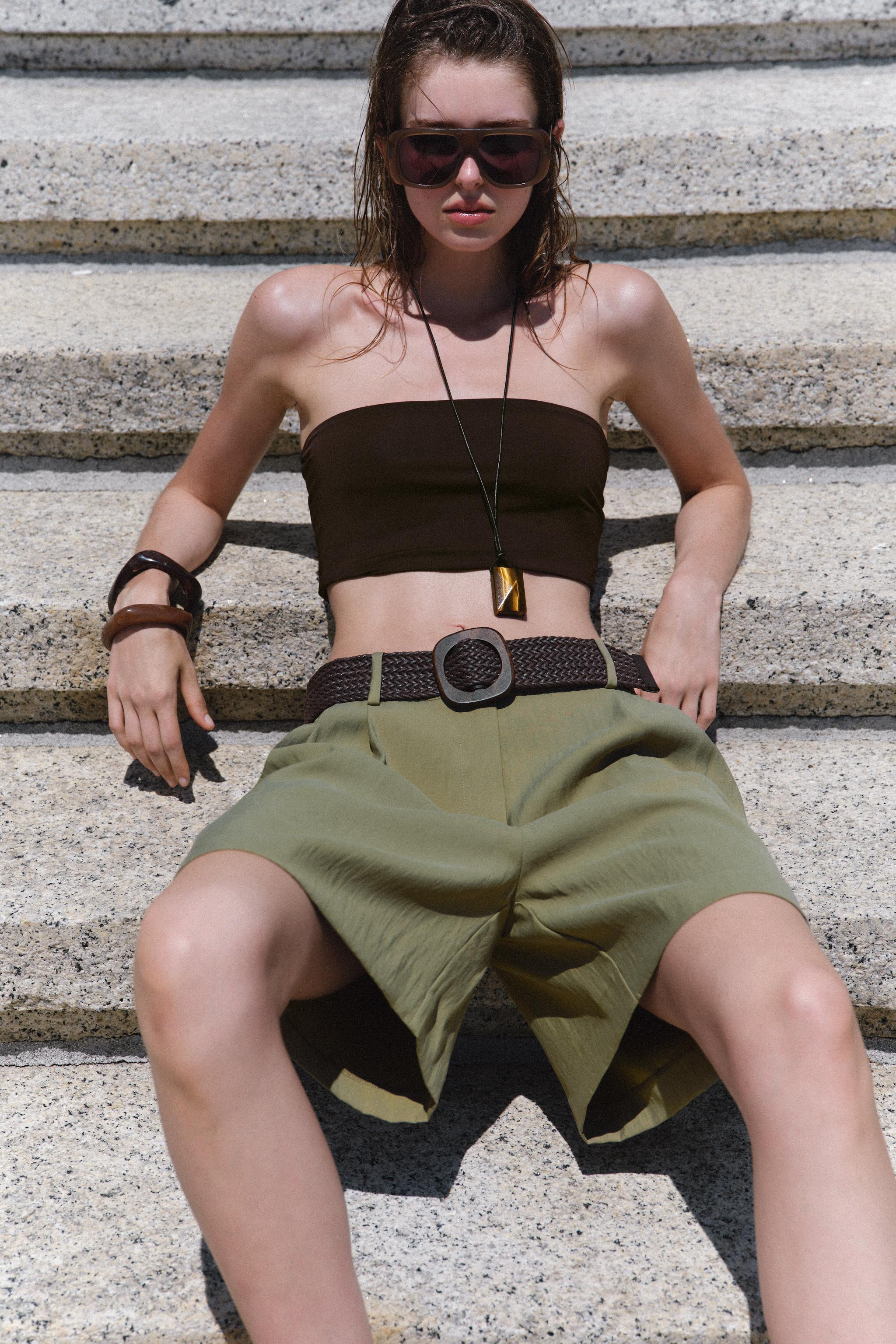 High-waist Bermuda shorts with front darts and braided belt. Front pockets. Front fastening with ... | Zara UK