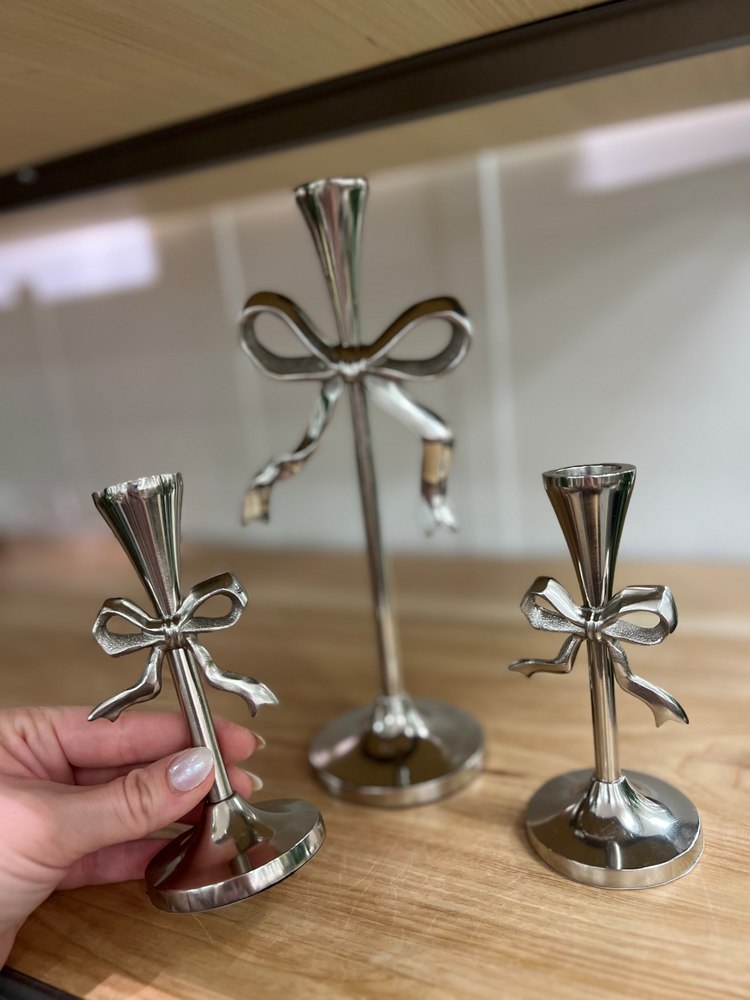 Ready for the Galentine party? Valentine’s Day decor - Valentine's Day Bow Taper Candle Holder Silver - Threshold. 

#LTKFindsUnder50 #LTKHome #LTKSeasonal