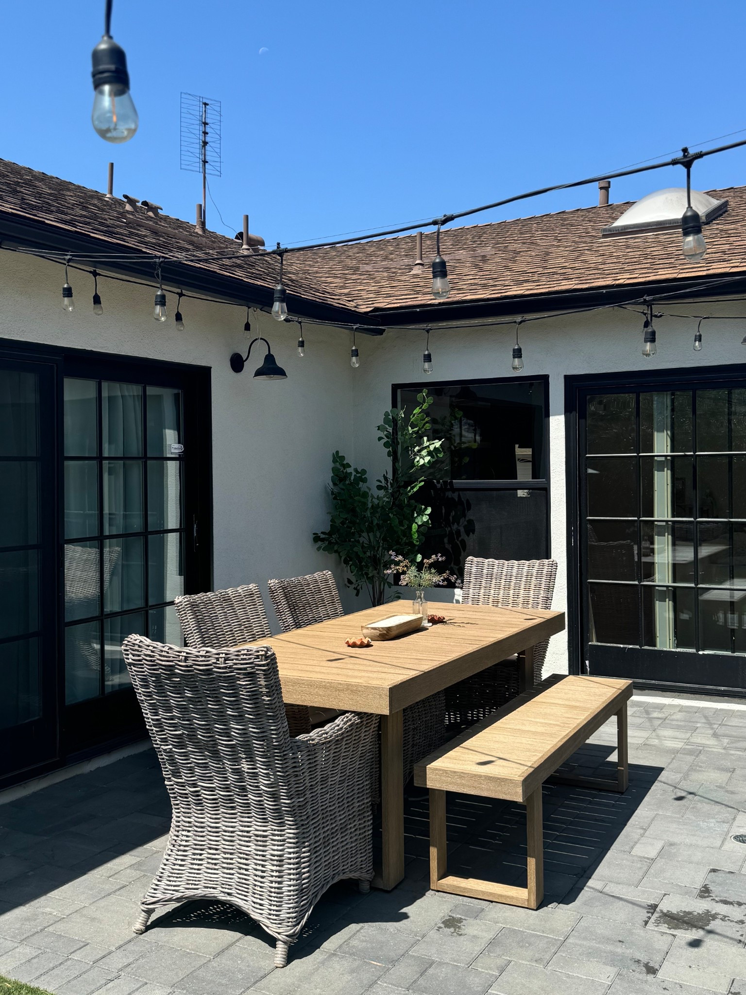 Table and bench are in the color ‘Reef’ - woven chairs were FB marketplace find 