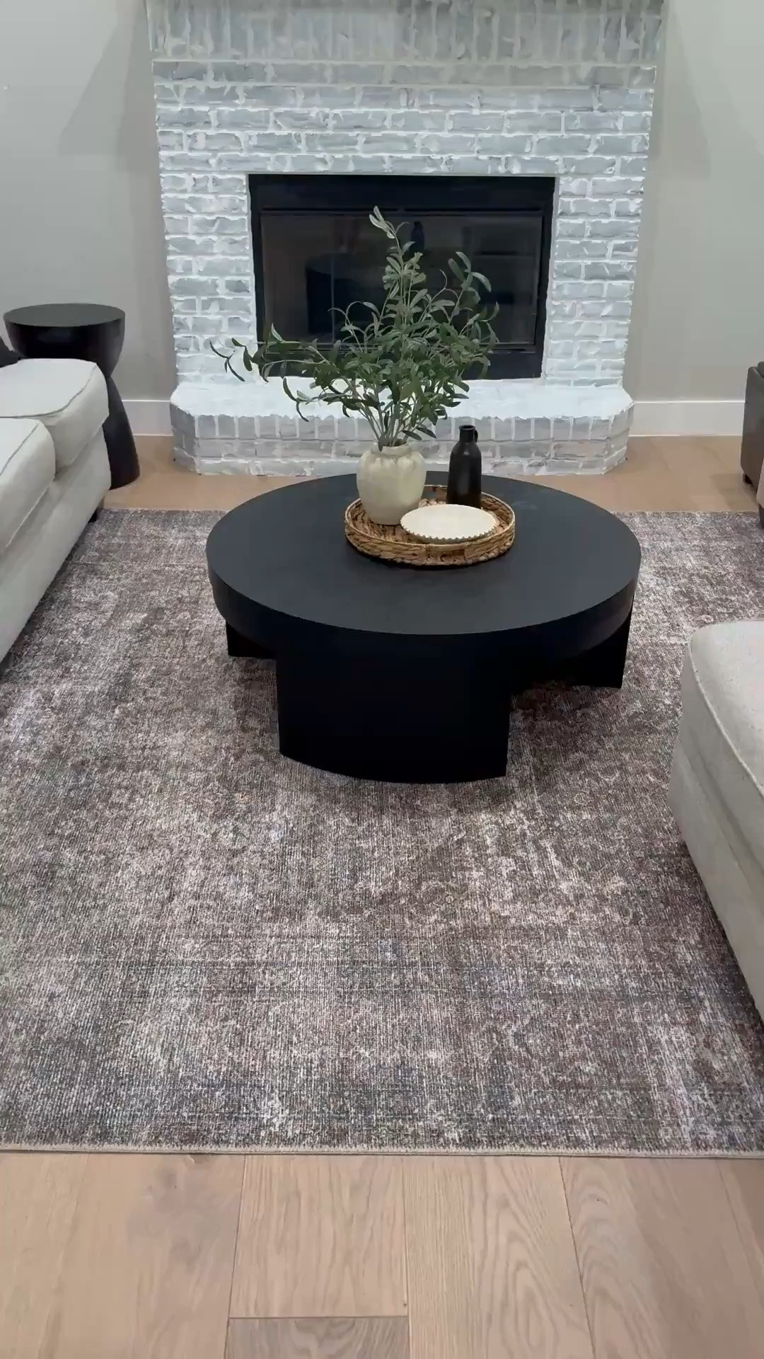 Living room decor, black round coffee table, home decor, look for less, area rug

#LTKHome #LTKdayinmylife #LTKstorytime