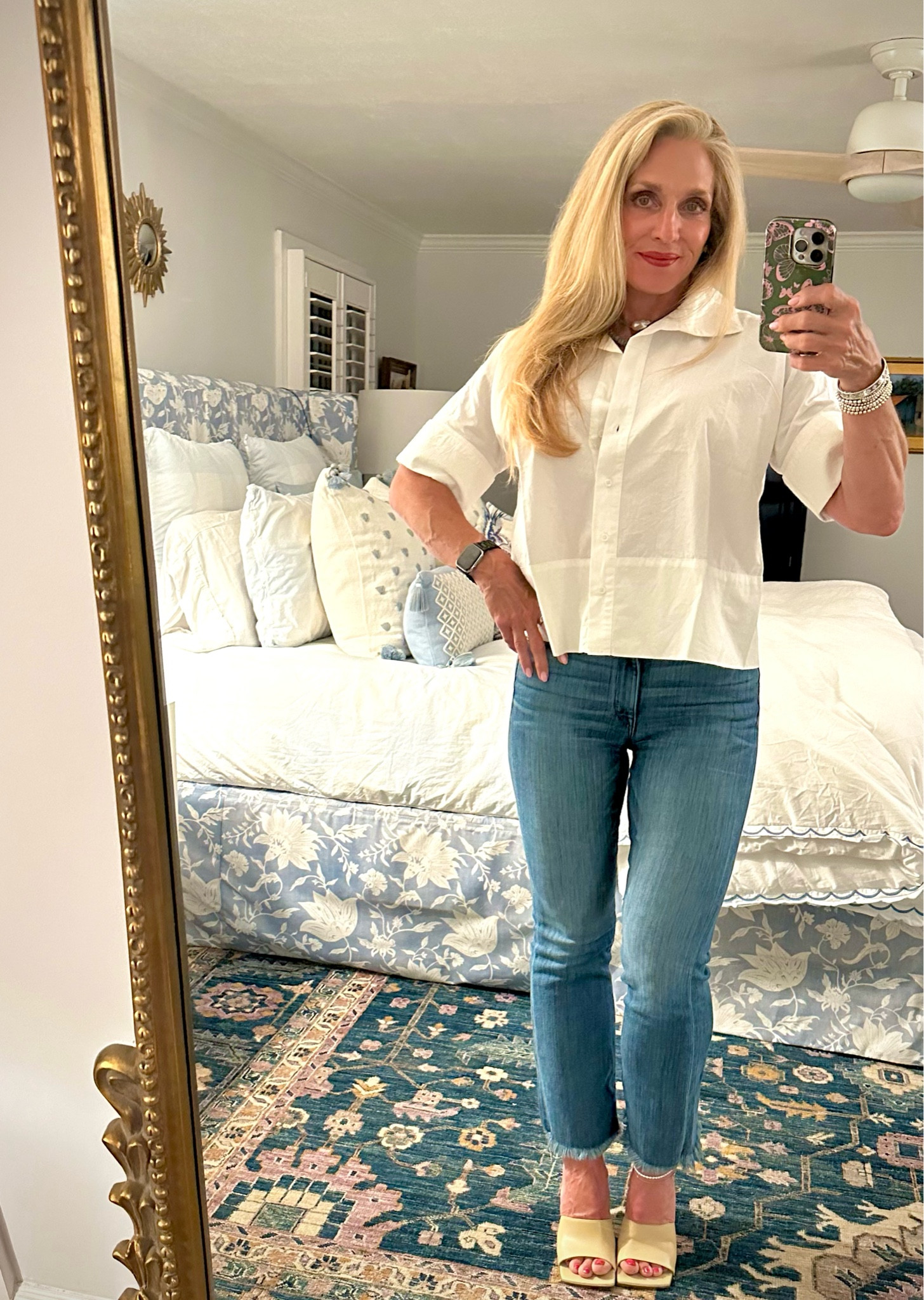 Date Night ♥️ This 
Cotton poplin “swing top” is absolutely perfect! I’m OBSESSED with Julia Amory… EVERYTHING!! her slow fashion pieces routed in retro styles seem fresh and easy to wear!  Sizes do seem to run a bit on the small side, although apparently she’s addressed this just recently. I’m wearing a small. Also, these AYR POP jeans are a favorite on repeat! Loving the unhemmed bottoms and these jeans have so much stretch you’ll wonder if you’re wearing leggings. AYR runs TTS, maybe leans a bit towards the bigger side. I’m wearing a 26. Heeled slides are Bottega Venetta, im wearing a 38.5 and beaded gem stands and from my favorite bead queen Kate @encircledjewels.

#LTKStyleTip #LTKOver40