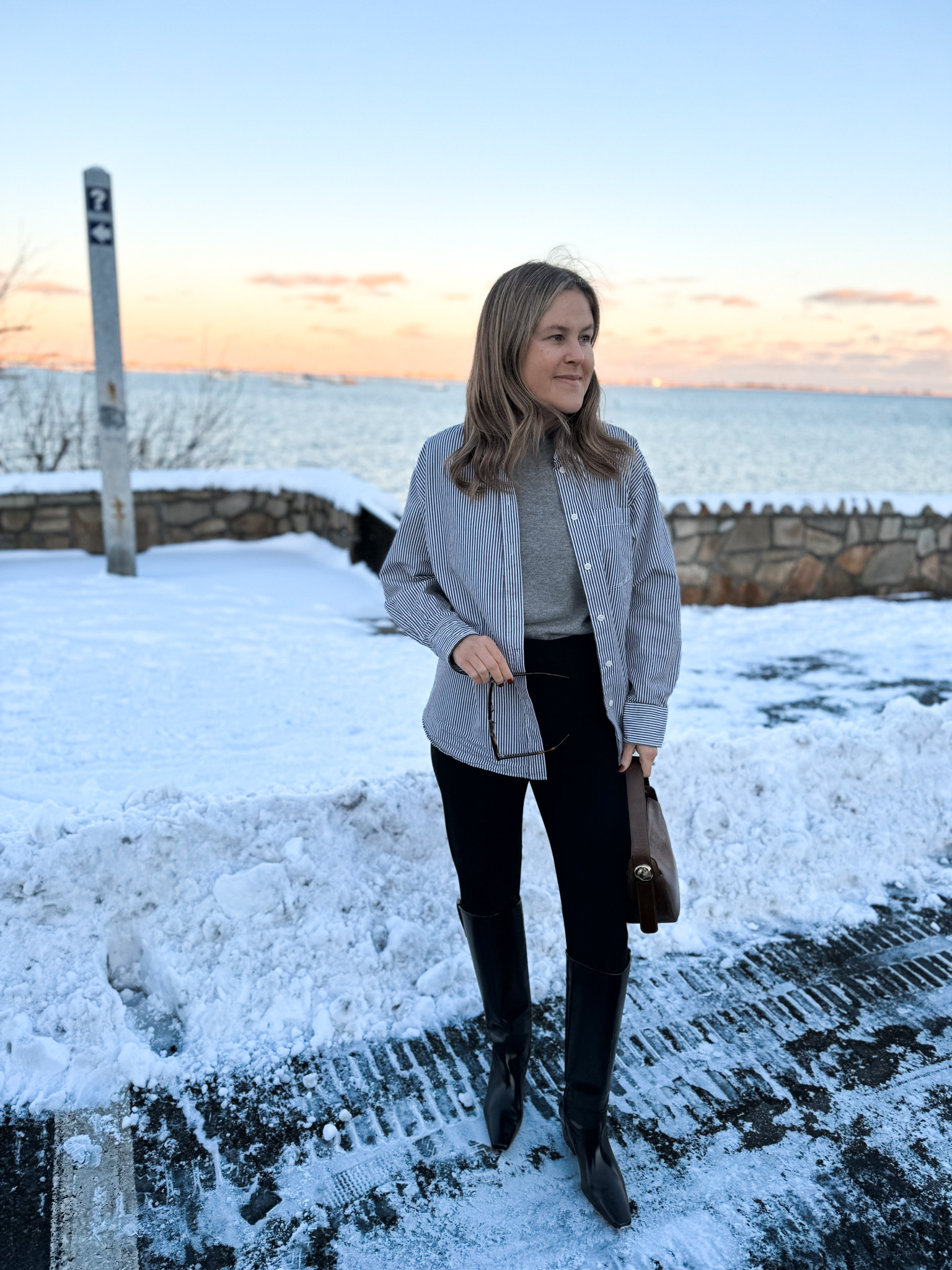 Winter outfit idea. My shirt and stirrup pants are on sale. You can make this a cozy travel outfit by wearing Ugg boots instead of knee high boots. I'm wearing a size 6 petite and I'm 5'4. If you're 5'4 or under, definitely order the petite length. I'm a 27/28 waist 

 #LTKmomlife #LTKSeasonal