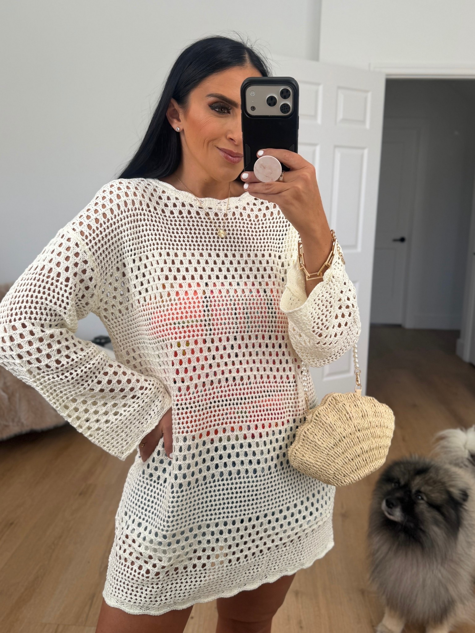 Women’s crochet swimsuit coverup wearing size medium. 