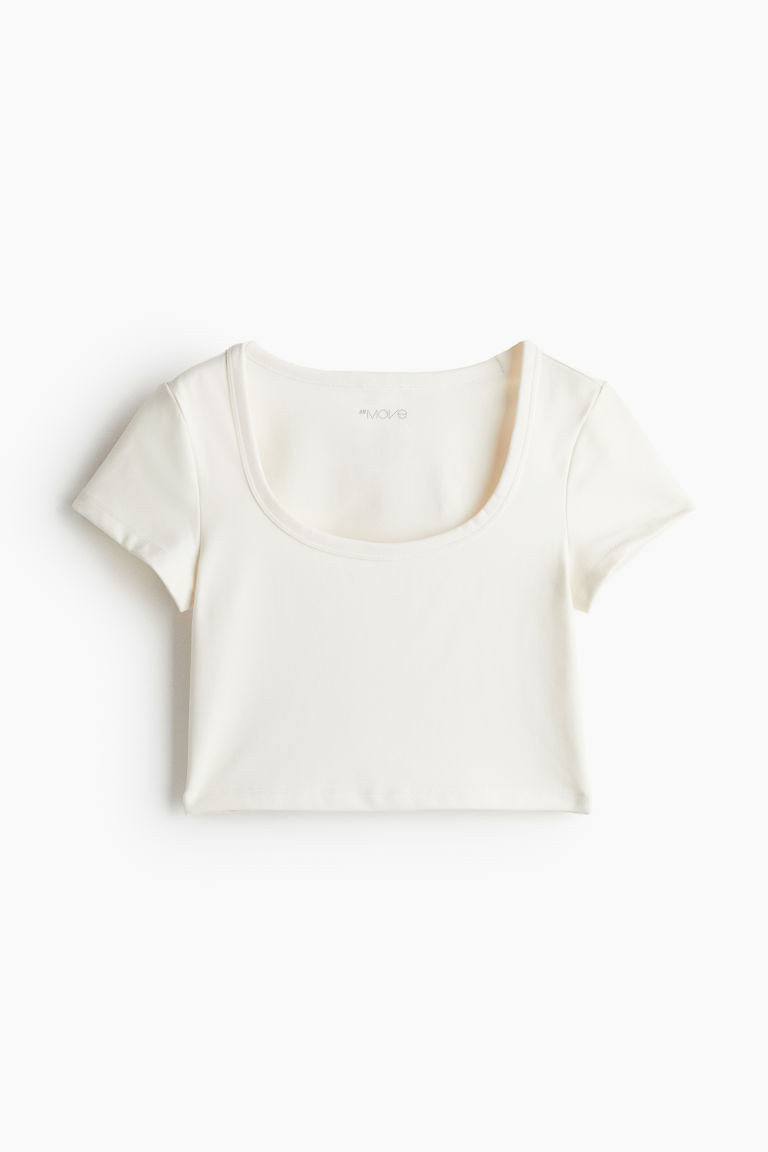 H & M - Cropped sports top in DryMove - White | H&M (UK, MY, IN, SG, PH, TW, HK)
