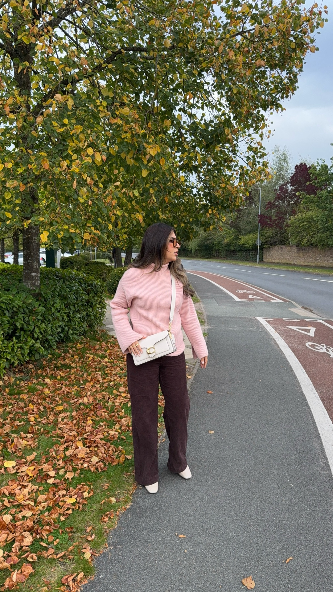 Autumn fall modest outfit ideas pink jumper and brown trousers 

#LTKFashionMonth #LTKmodest