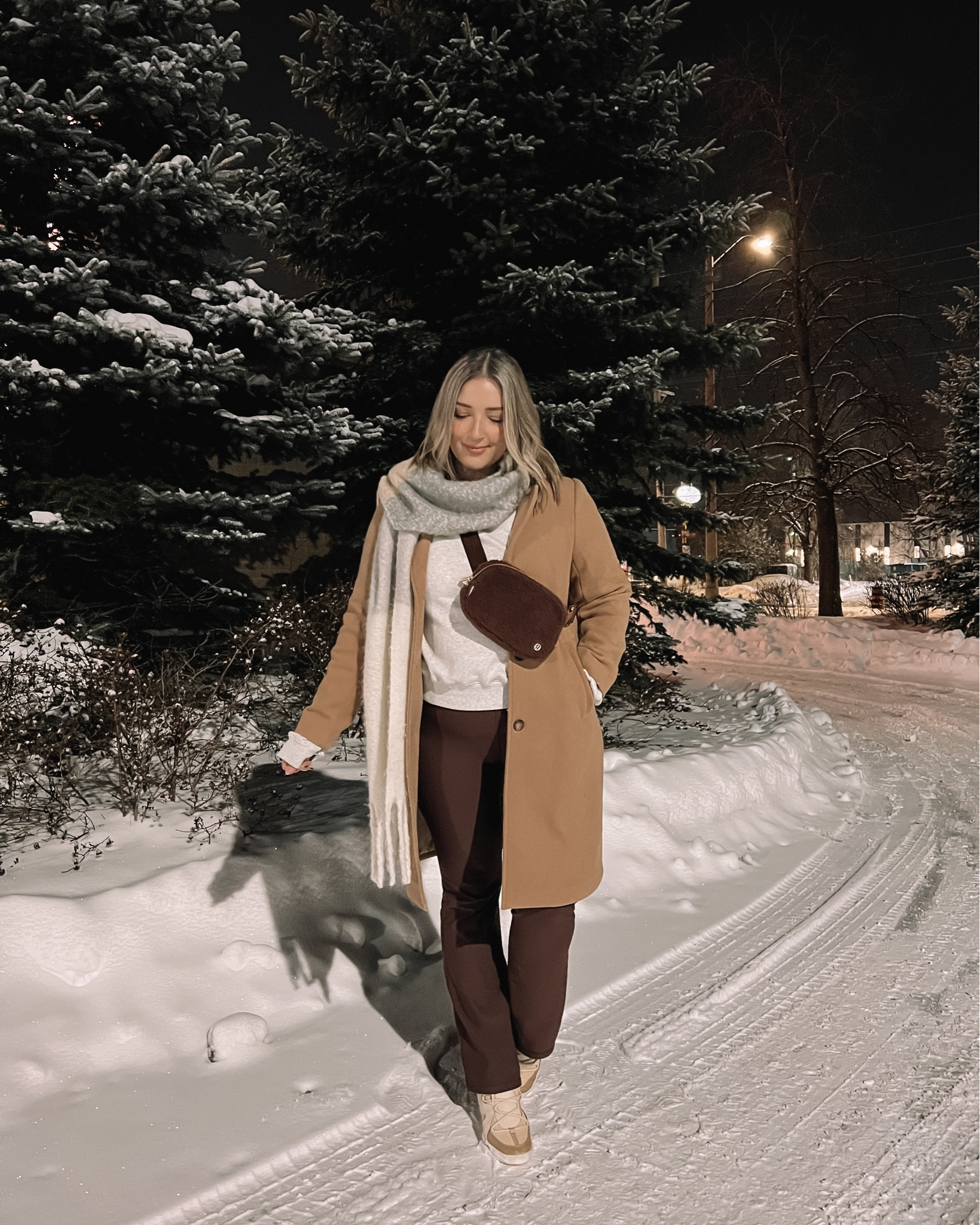 Midsize winter outfit - classic camel coat, basic sweatshirt, Amazon fleece lined leggings, sherpa belt bag, neutral scarf 

Athleisure style, winter fashion trends


#LTKstyletip #LTKmidsize #LTKSeasonal