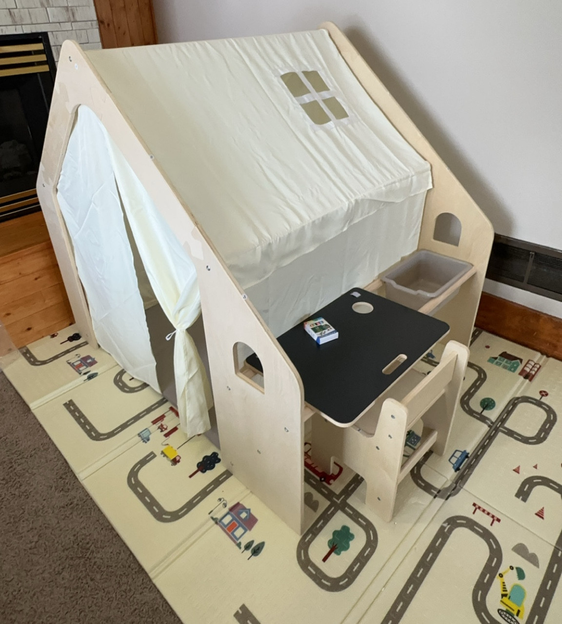 Santa brought the coolest tent for the boys. This is going to house soooo many memories!! 
Our 2 1/1 year old loves building tents with blankets to hide in, so this seemed like the perfect gift. It has a storage tub and a chalk board desk to color on with a box of assorted colored chalk. 
It was sooooo easy to build but feels sturdy enough to withstand the wrath of my destructive toddler  

#LTKHome #LTKGiftGuide #LTKKids