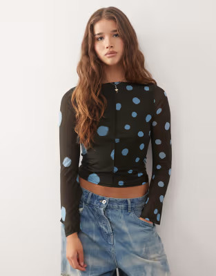 Reclaimed Vintage - Top met rechte hals, uitlopende mouwen en gesplitste vervaagde stippenprint i... | ASOS (Global)