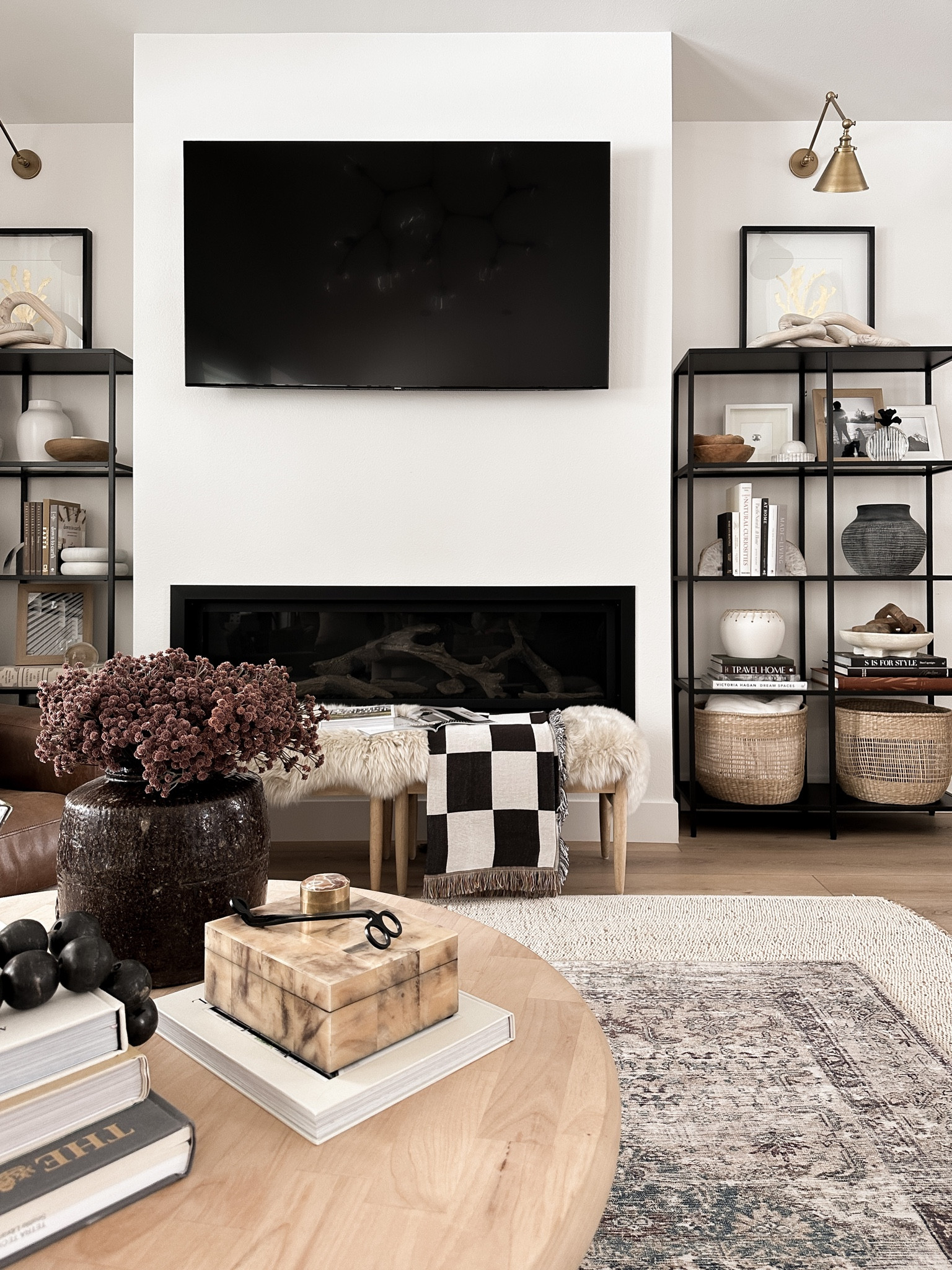 My top favorite decor in my living room eight now is my vintage brown pottery, checkered blanket, faux checkered horn box, burgundy florals, chinky black beads, my decor book, sheep rug, loloi rug, layered rug and diy coffee table.

#amazon #hobbylobby #loloi #tjmaxx #jennikayne #ikea #potterybarn #anthropologie 

#LTKhome #LTKFind #LTKstyletip