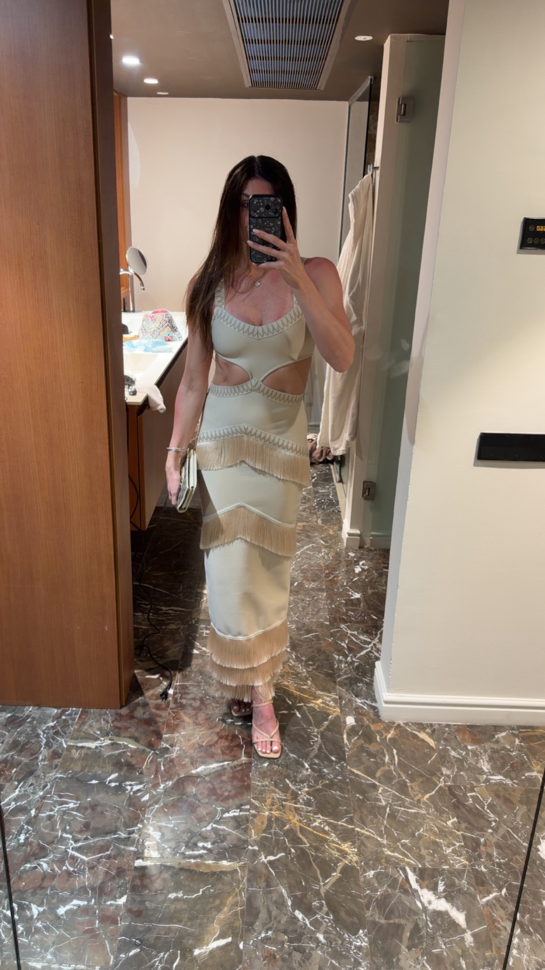 Thicker material with stretch. Fringe is so fun and flattering when you walk. Got the most compliments when I wore this. Size medium. 

#LTKTall #LTKTravel #LTKgrwm